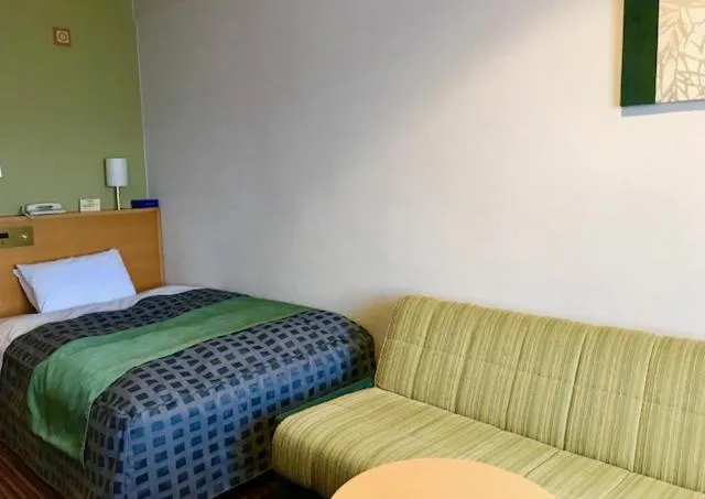 Bed in Okazaki New Grand Hotel