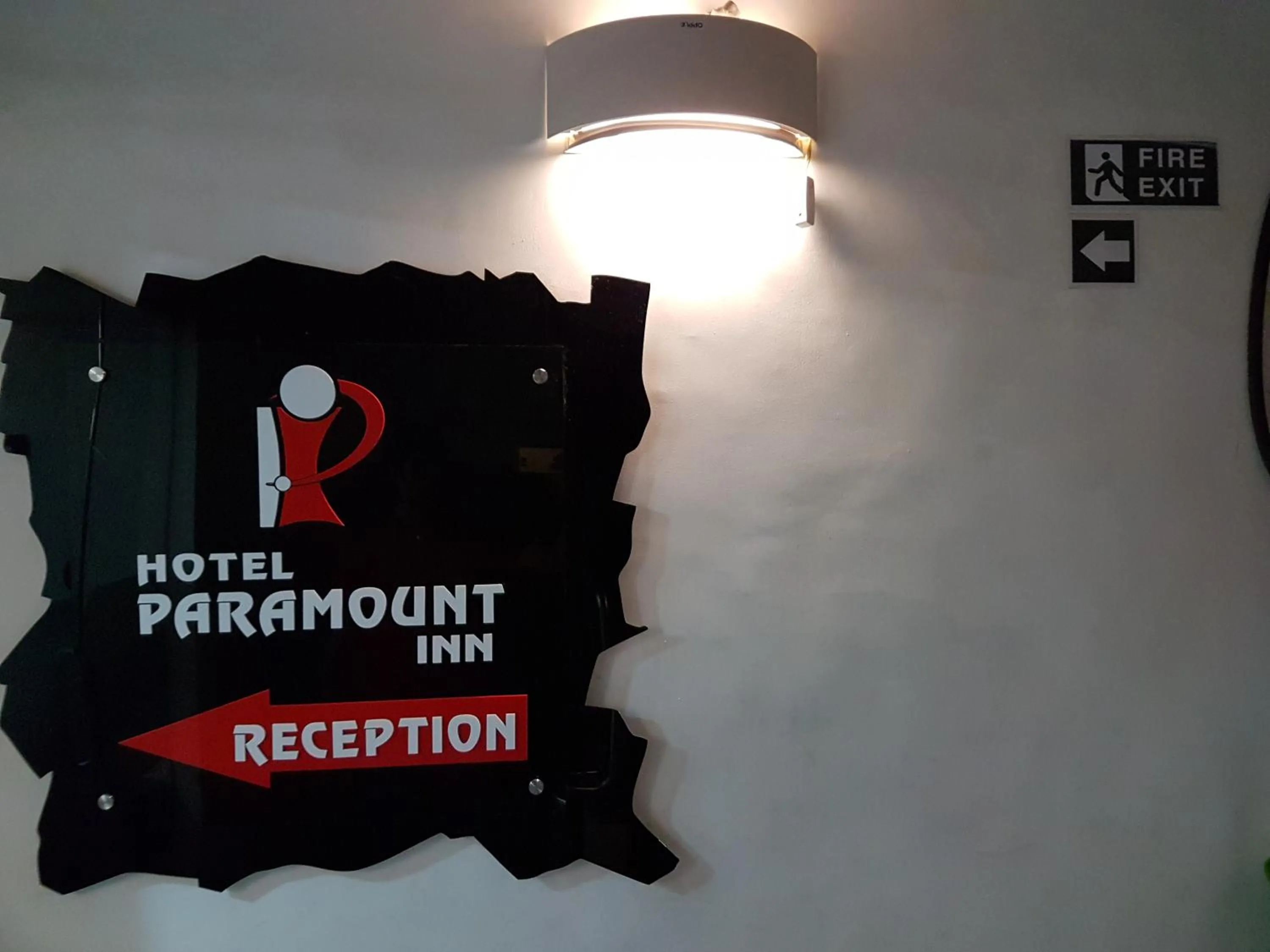 Property logo or sign in Hotel Paramount Inn