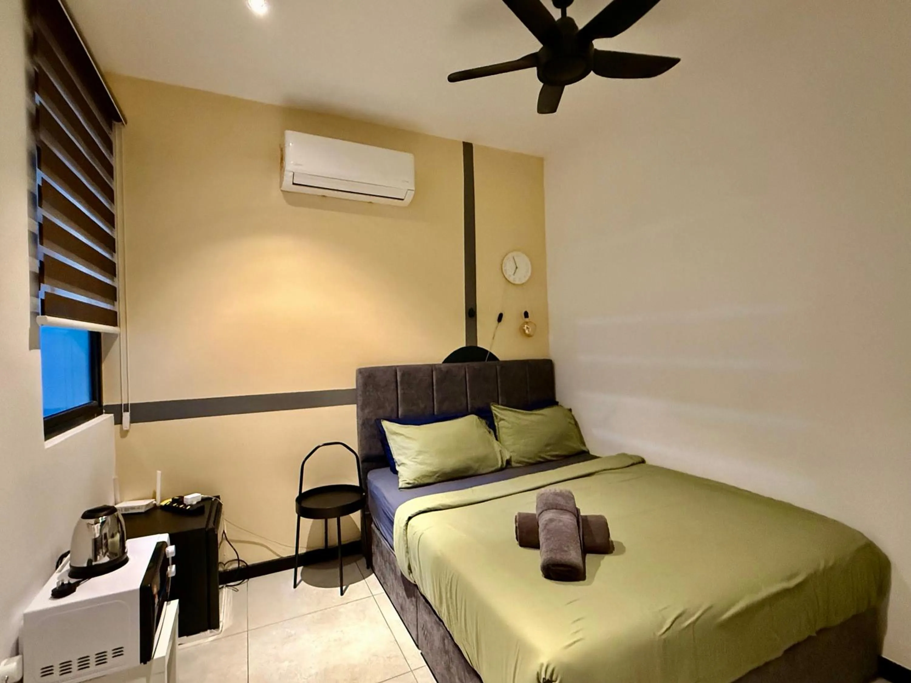 Bed in Neu Suites Service Apartment By Moonlight