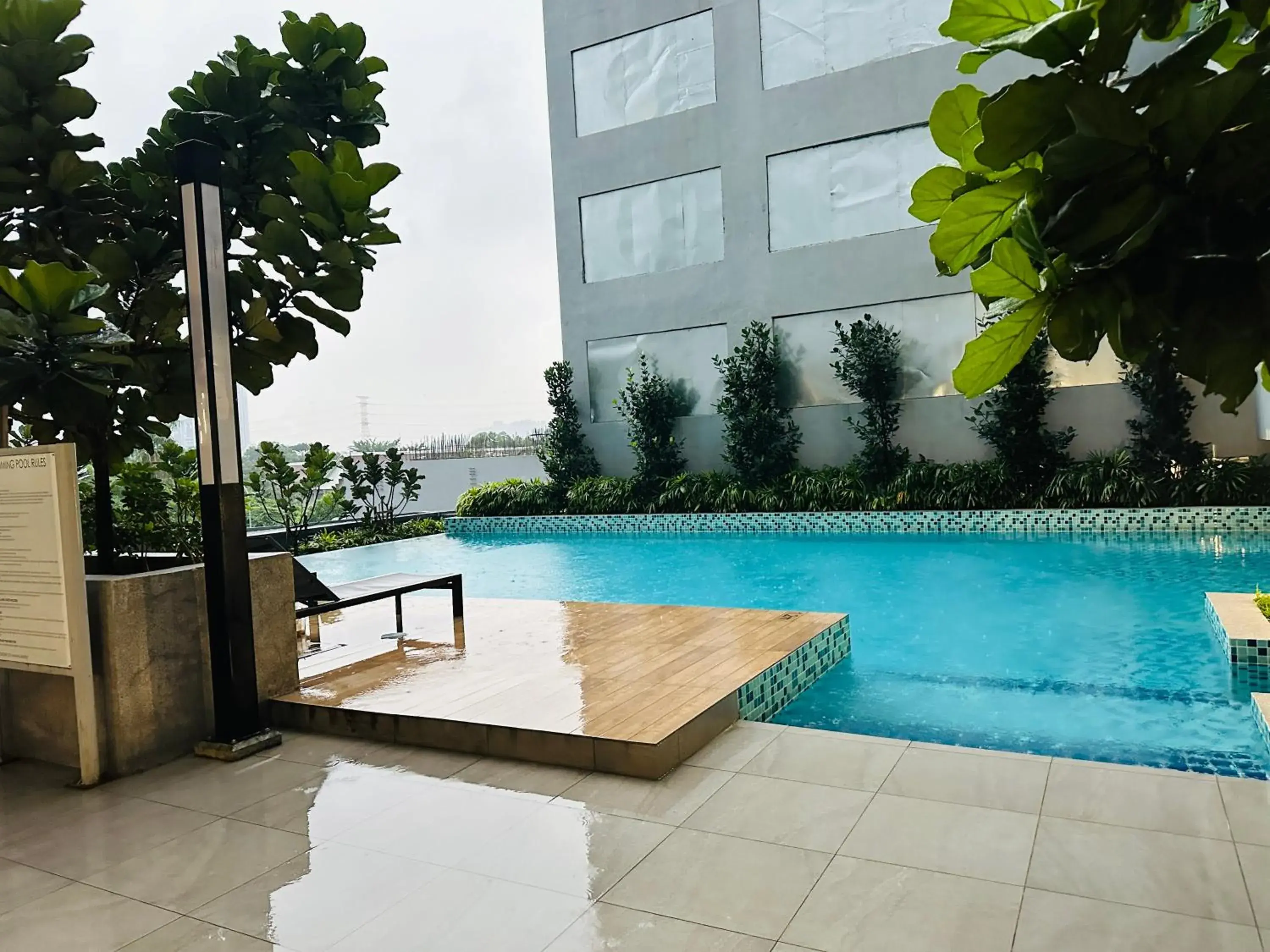 Pool view in Neu Suites Service Apartment By Moonlight Pool view in Neu Suites Service Apartment By Moonlight