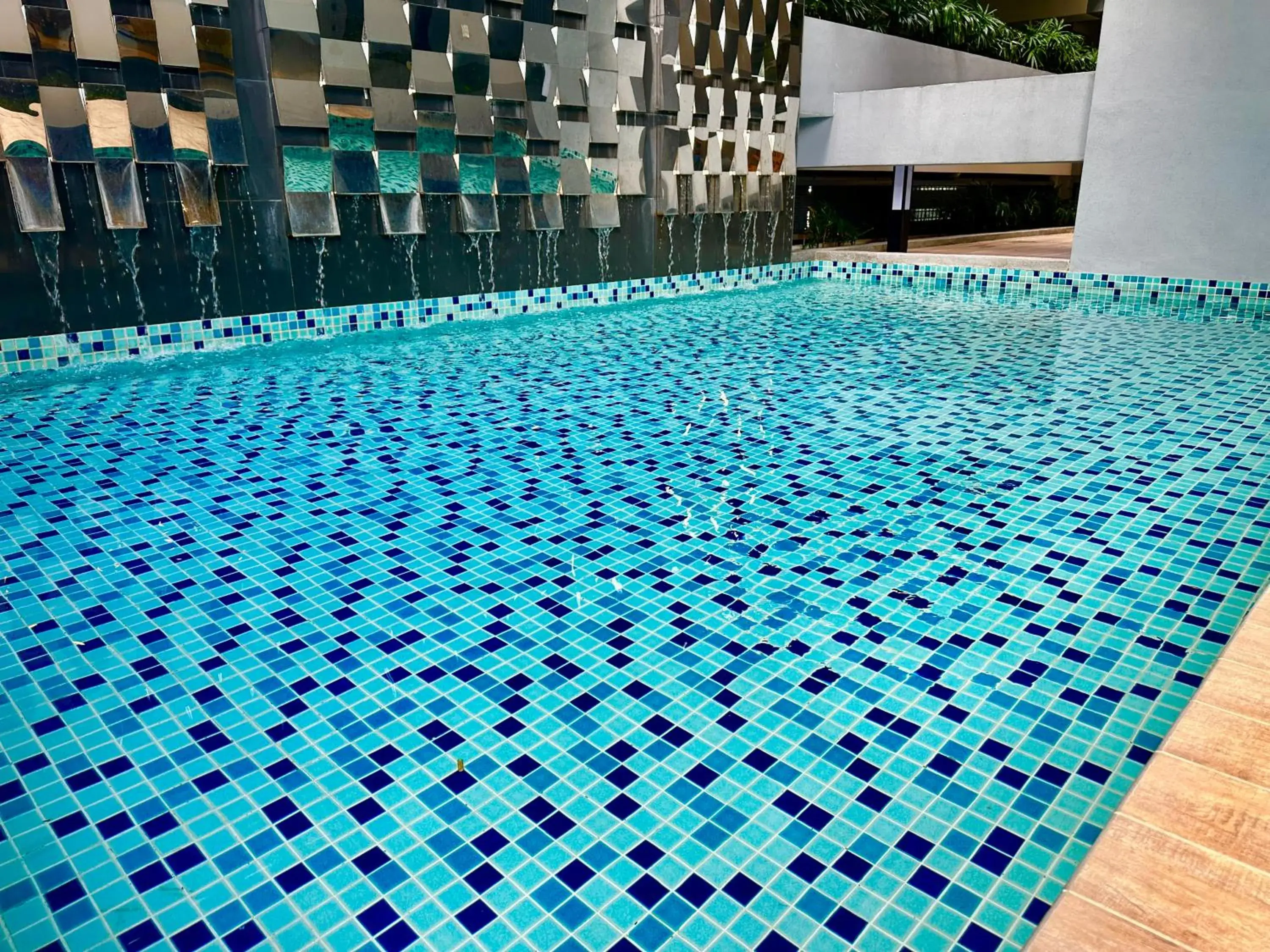 Pool view in Neu Suites Service Apartment By Moonlight Pool view in Neu Suites Service Apartment By Moonlight