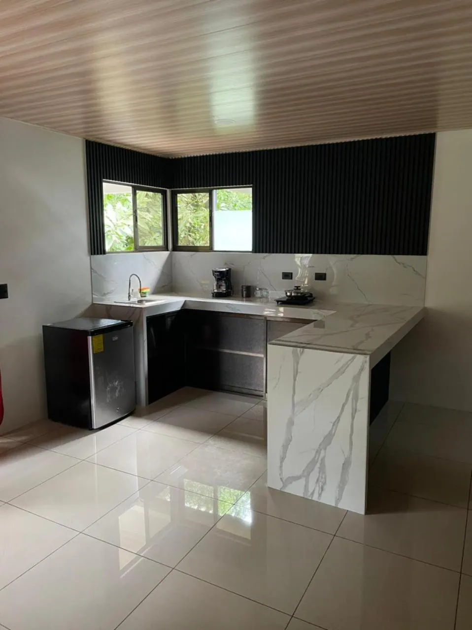 Kitchen or kitchenette in Cabinas La Catarata