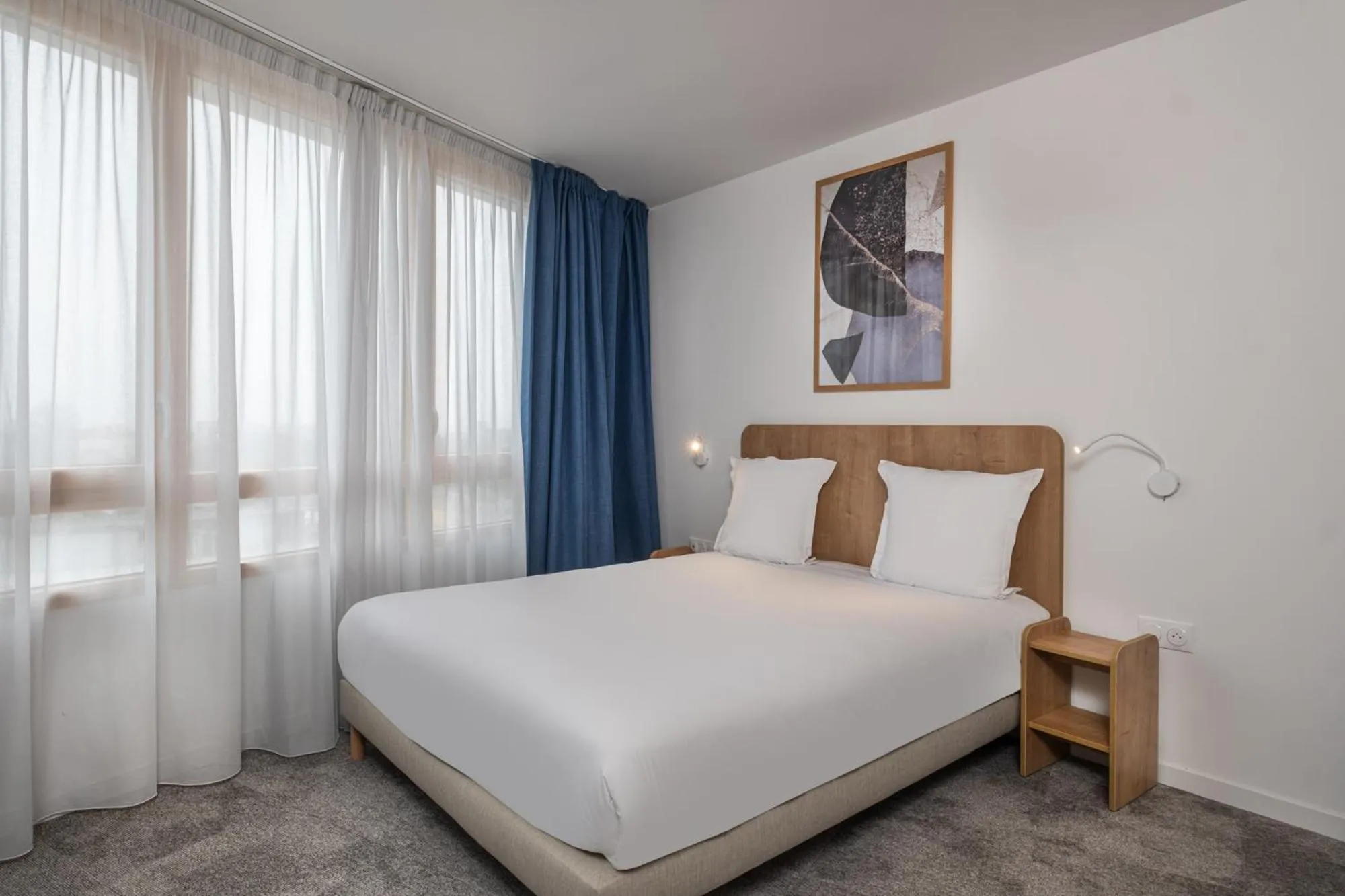 Photo of the whole room, Bed in The Originals Résidence Paris Sud Villejuif