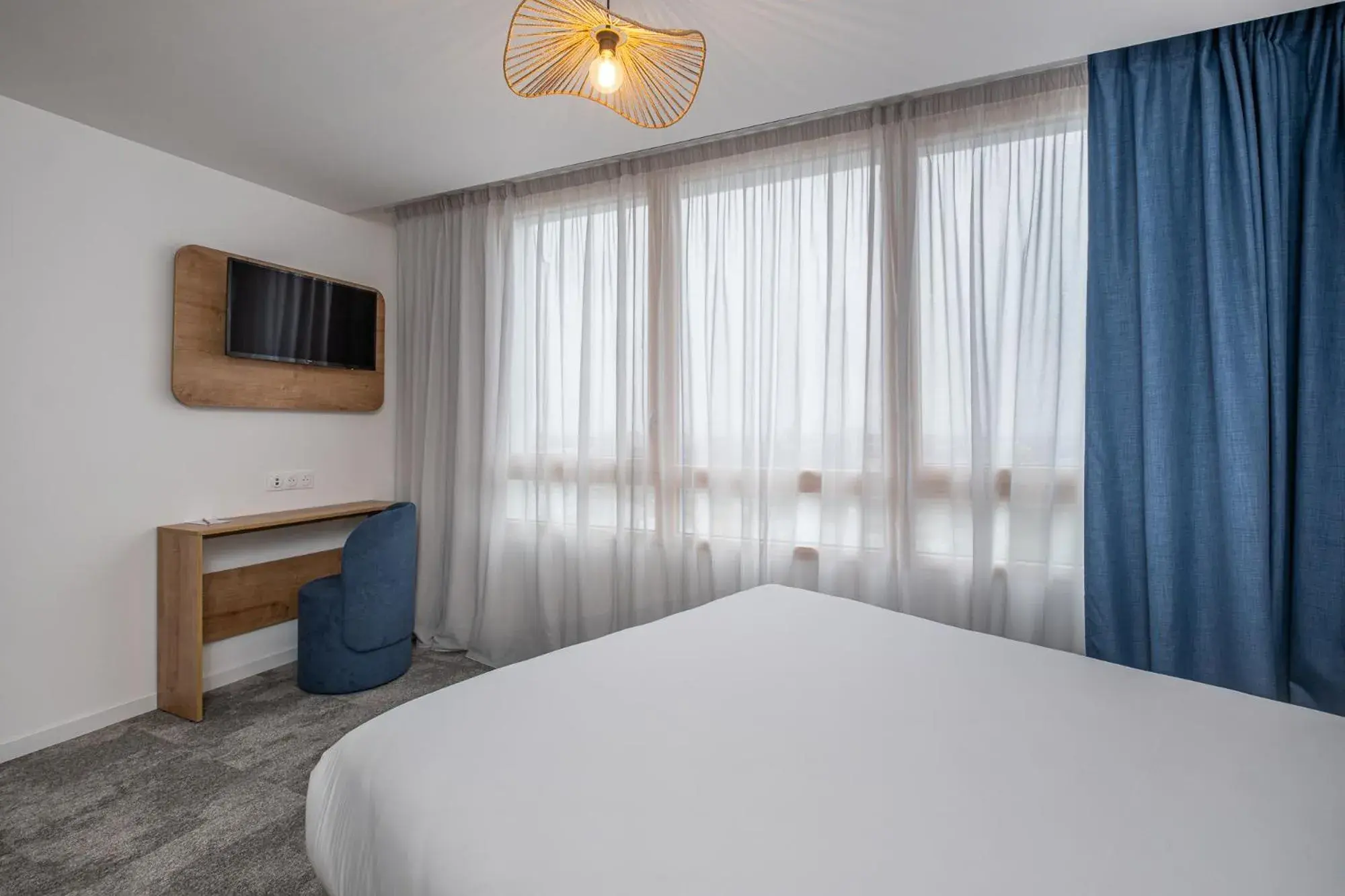 Bedroom, Bed in The Originals Résidence Paris Sud Villejuif Bedroom, Bed in The Originals Résidence Paris Sud Villejuif