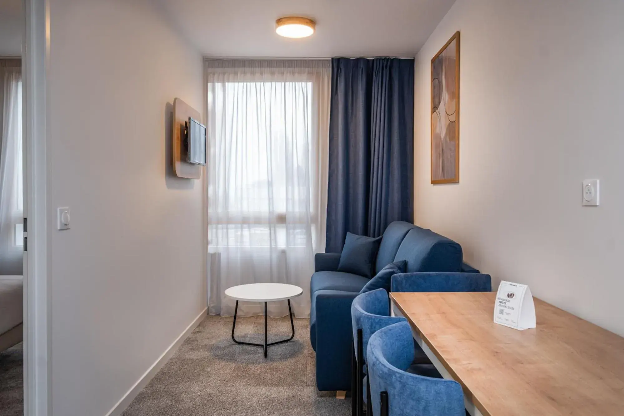 Living room in The Originals Résidence Paris Sud Villejuif Living room in The Originals Résidence Paris Sud Villejuif