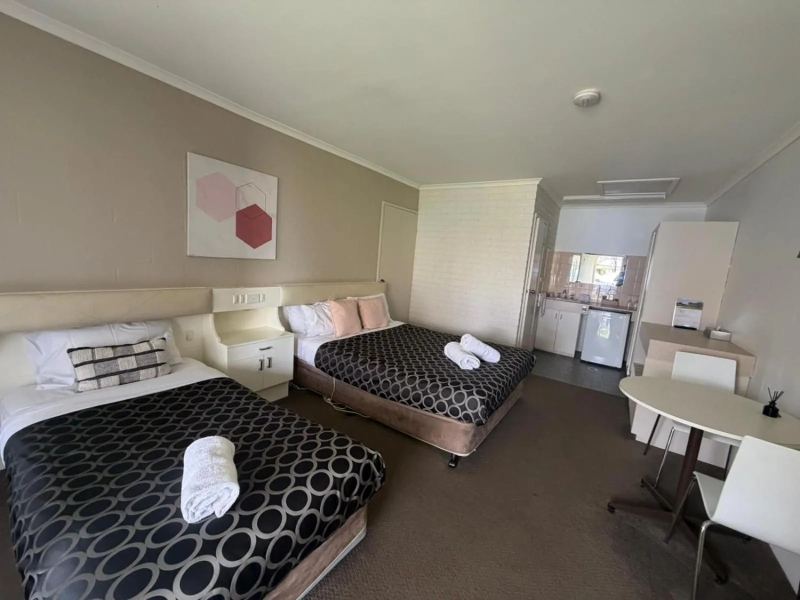Bed in CAPRICORN MOTOR inn
