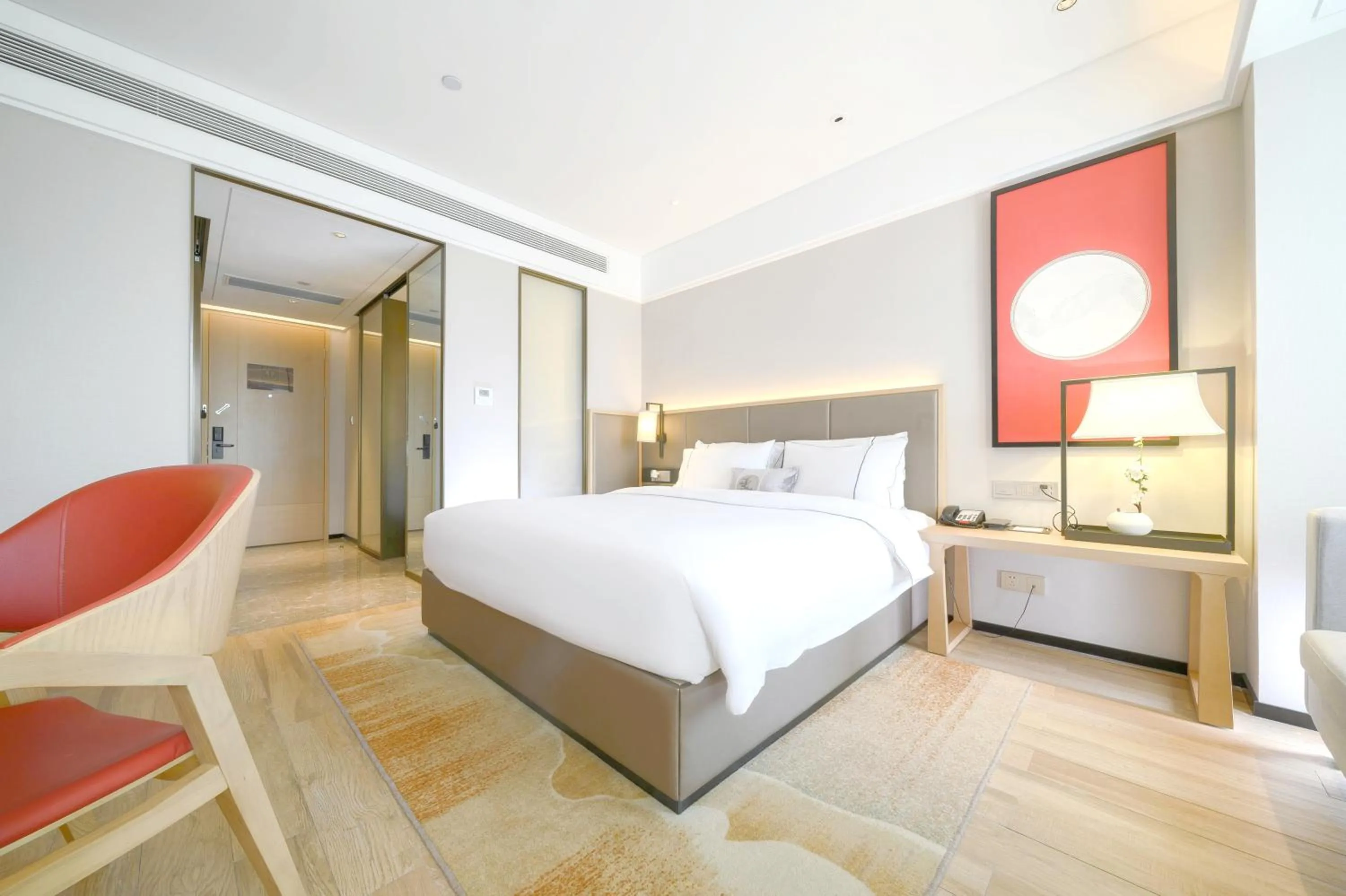 Photo of the whole room, Bed in ECHENG Hotel, Nanning Wanda Plaza Convention and Exhibition Center