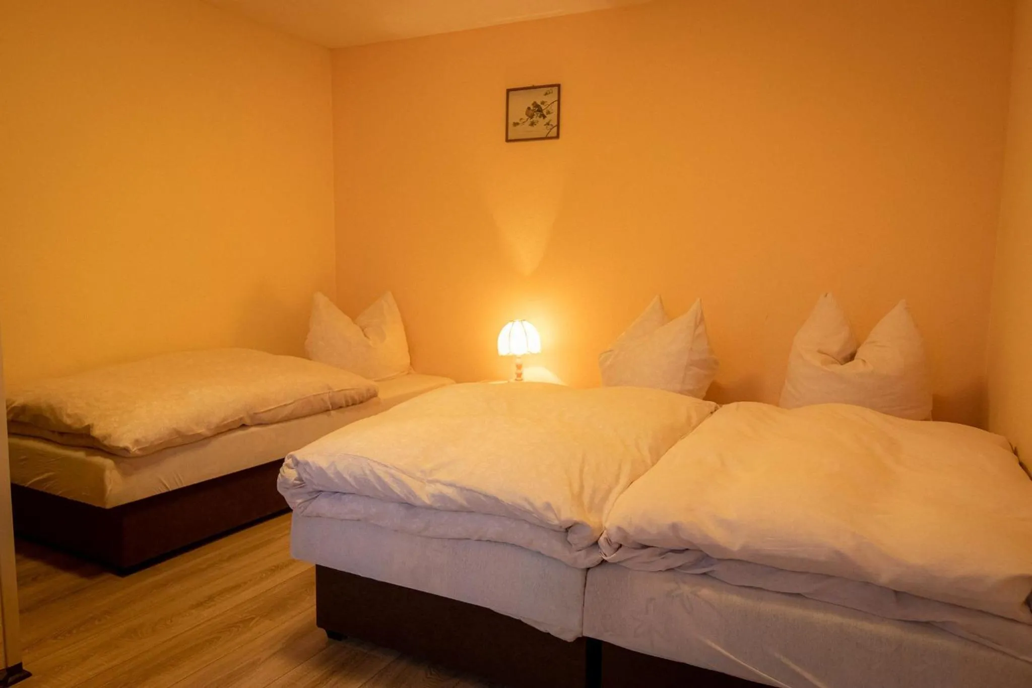 Bed in Apartments Greifswalder Chaussee