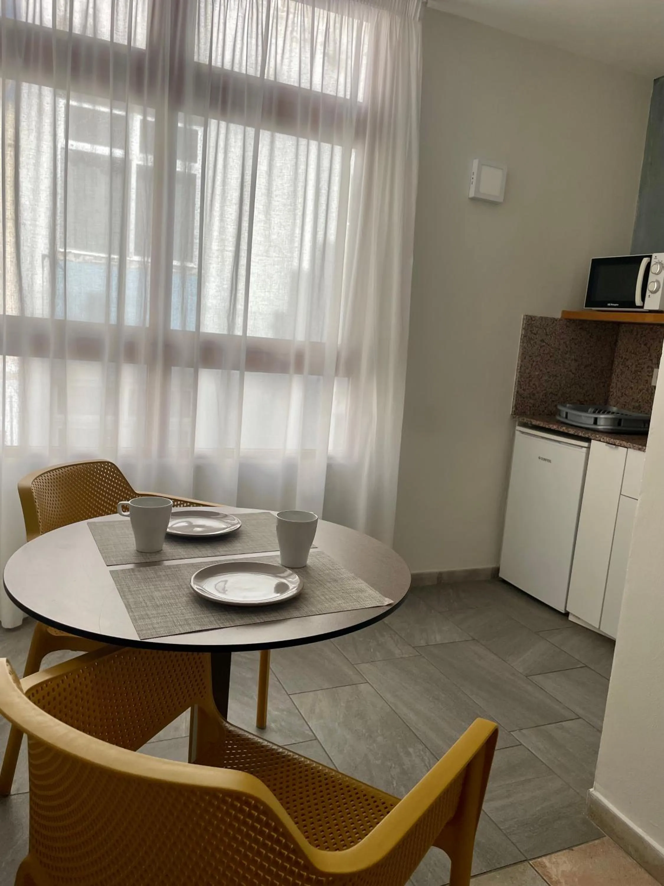 Kitchen or kitchenette in ApartHotel Idafe