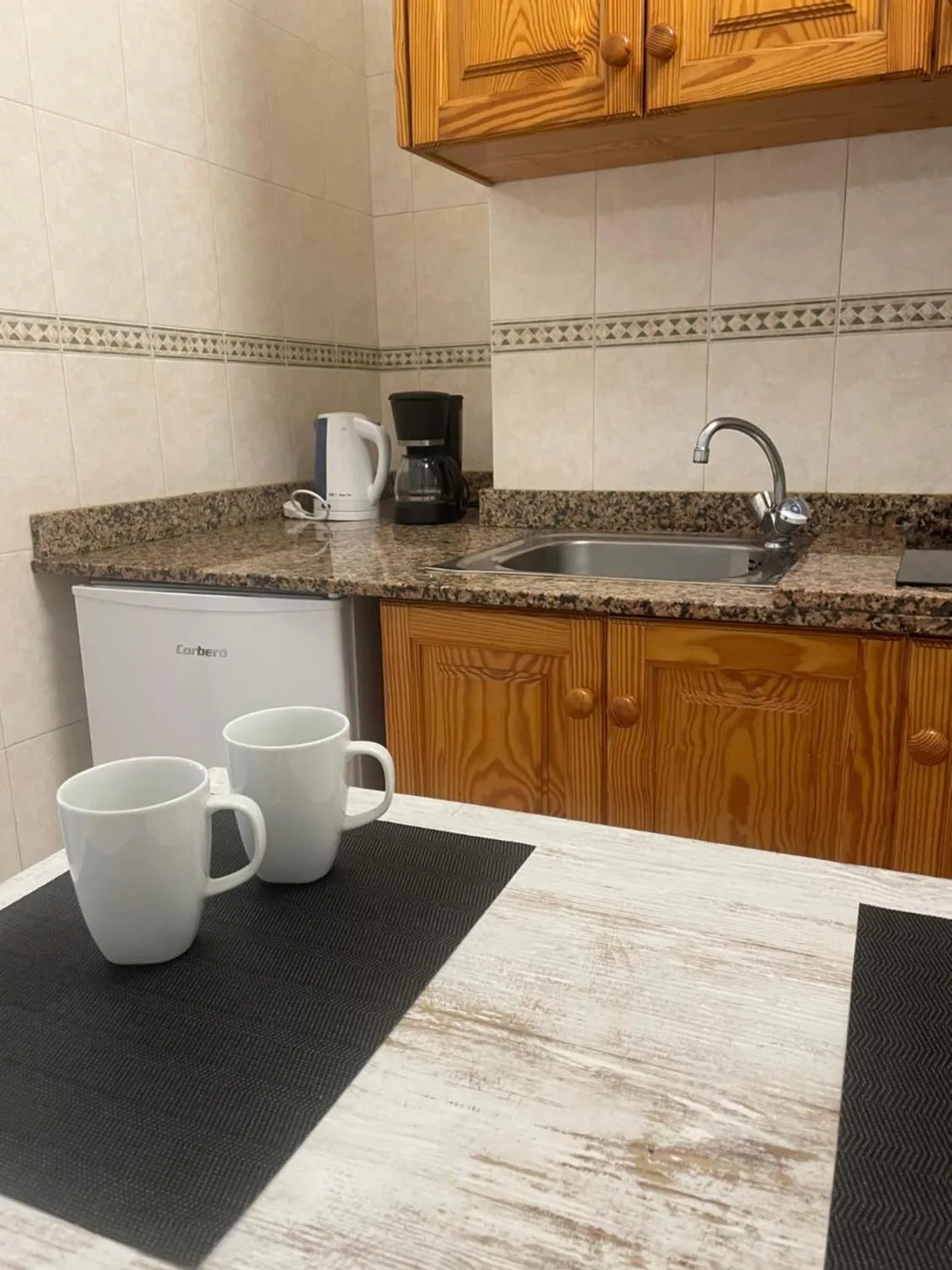 Kitchen or kitchenette in ApartHotel Idafe