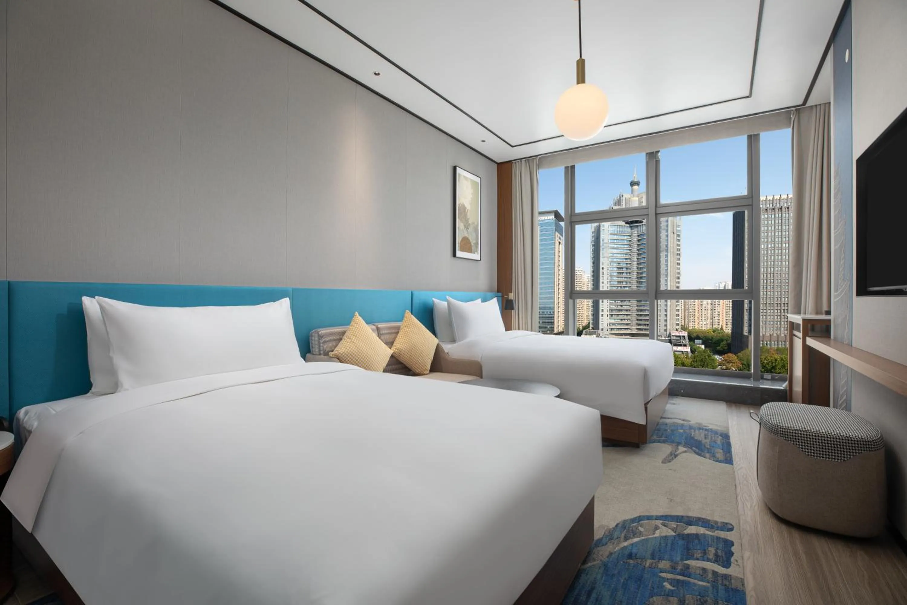 Bed in Hilton Garden Inn Luoyang Kaiyuan Avenue
