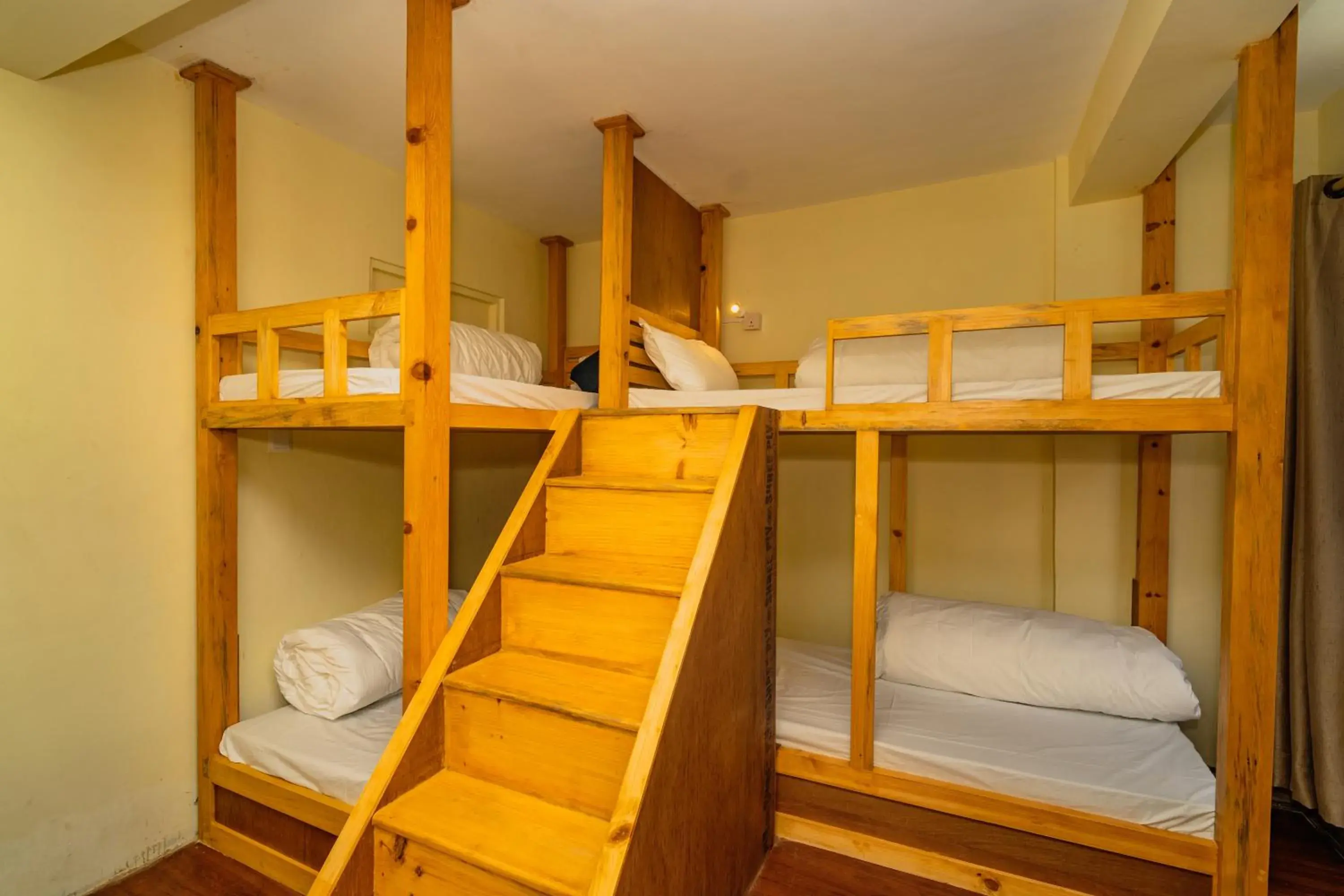 Bed in 4-Bed Mixed Dormitory Room in Hotel Aashraya Home Bed in 4-Bed Mixed Dormitory Room in Hotel Aashraya Home