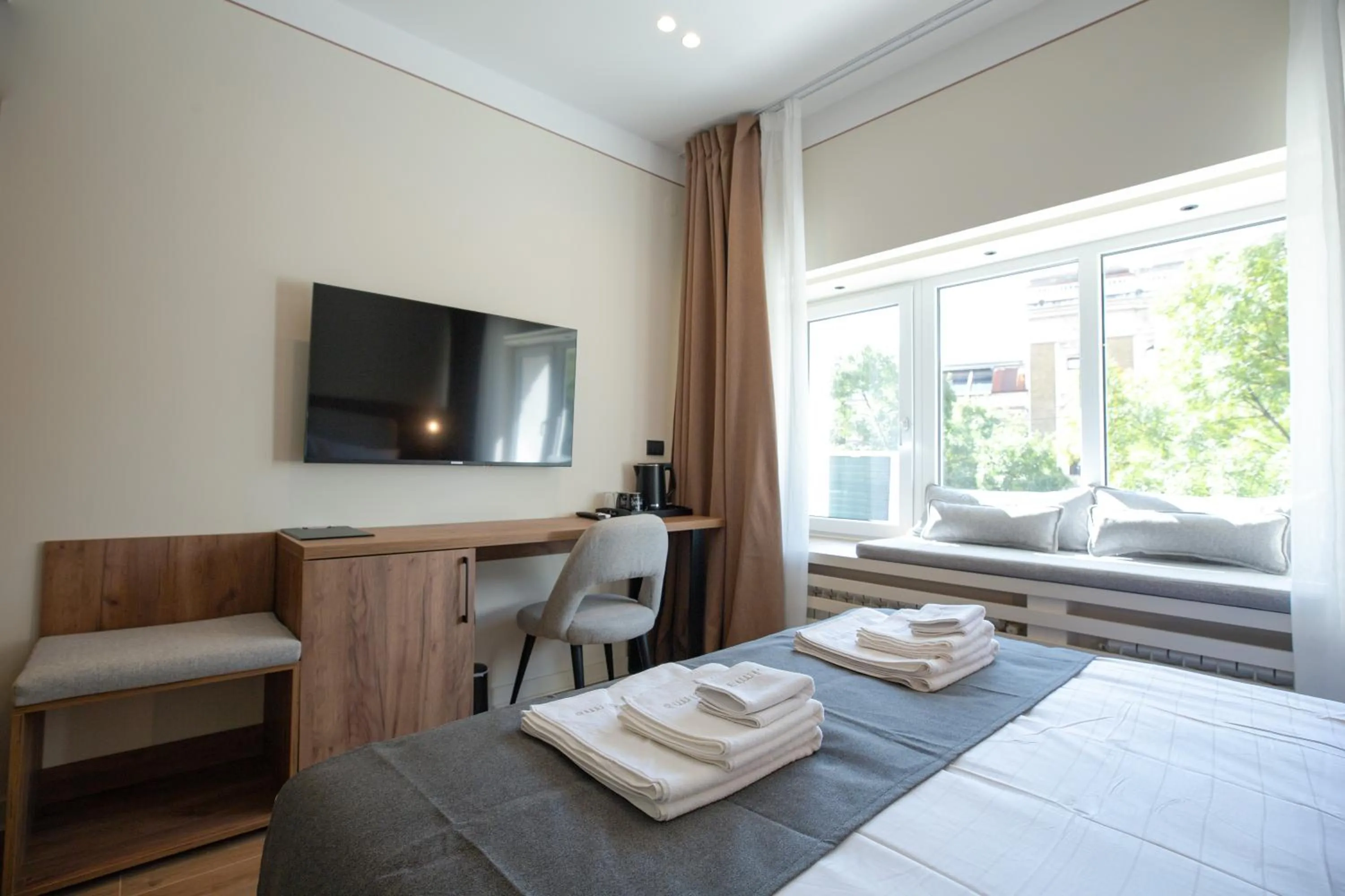 Bed in Simma Luxury Apartments & Rooms