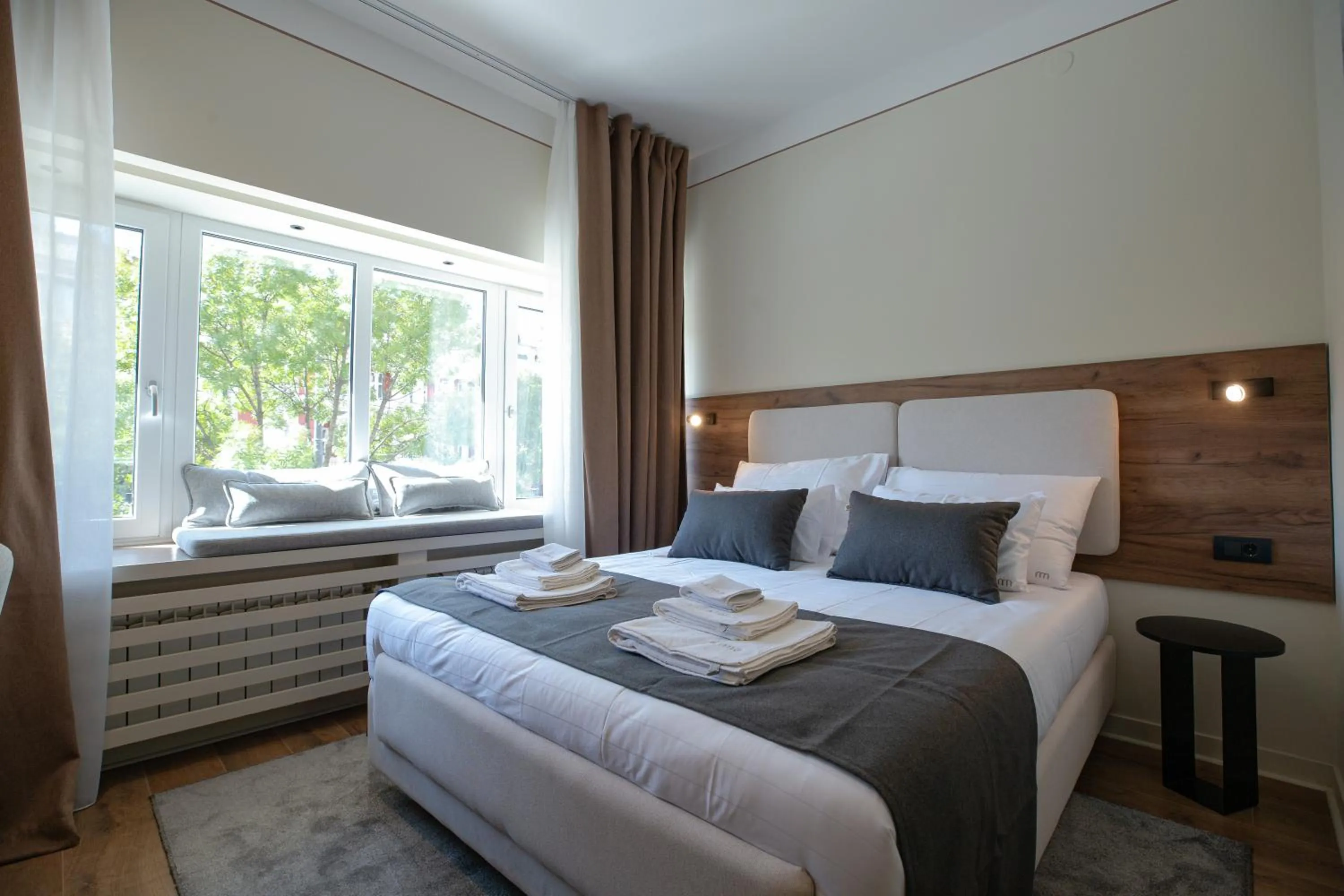 Bed in Simma Luxury Apartments & Rooms