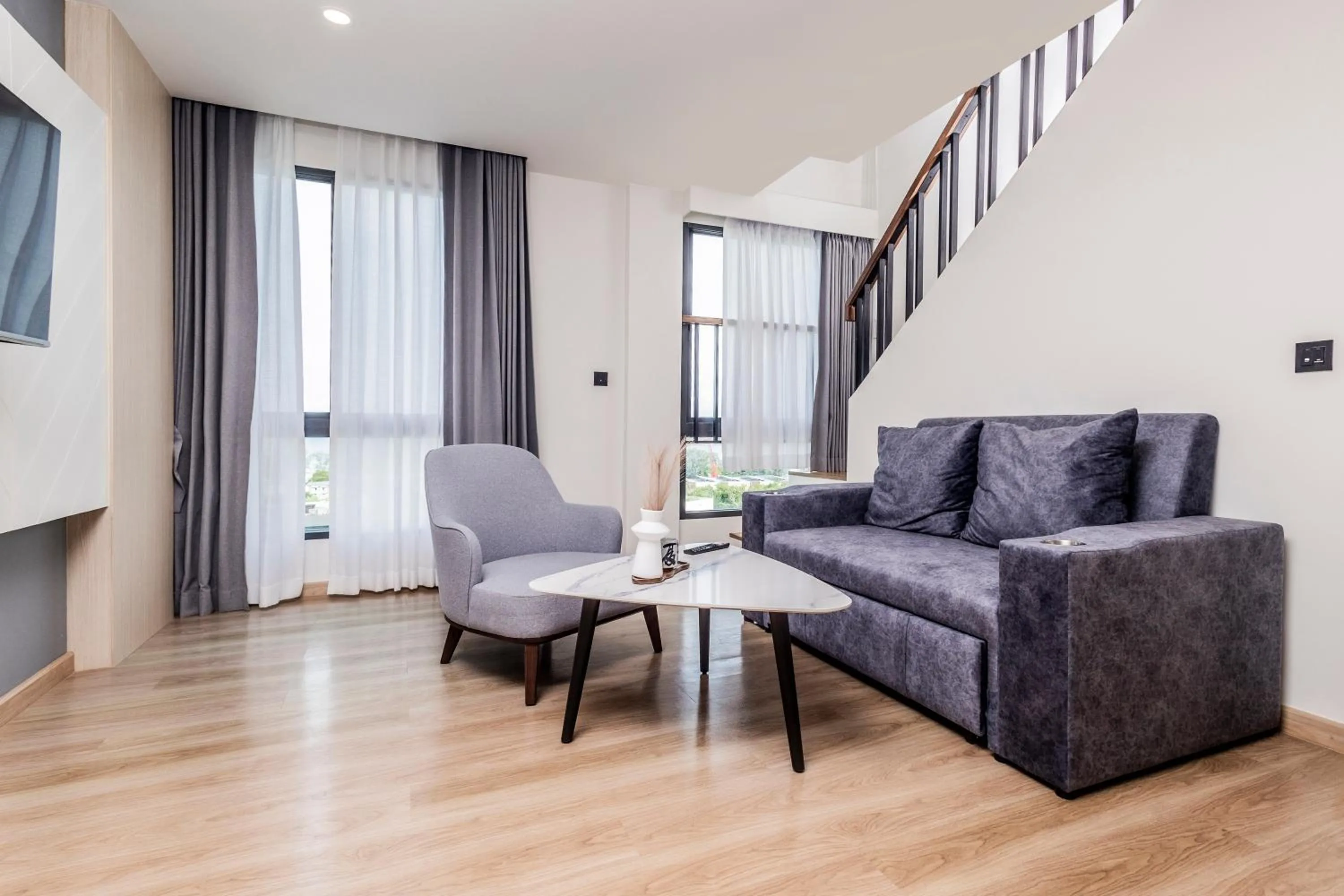 Living room in Duplex Liora 1BR PoolsGym Shuttle to Nai Harn