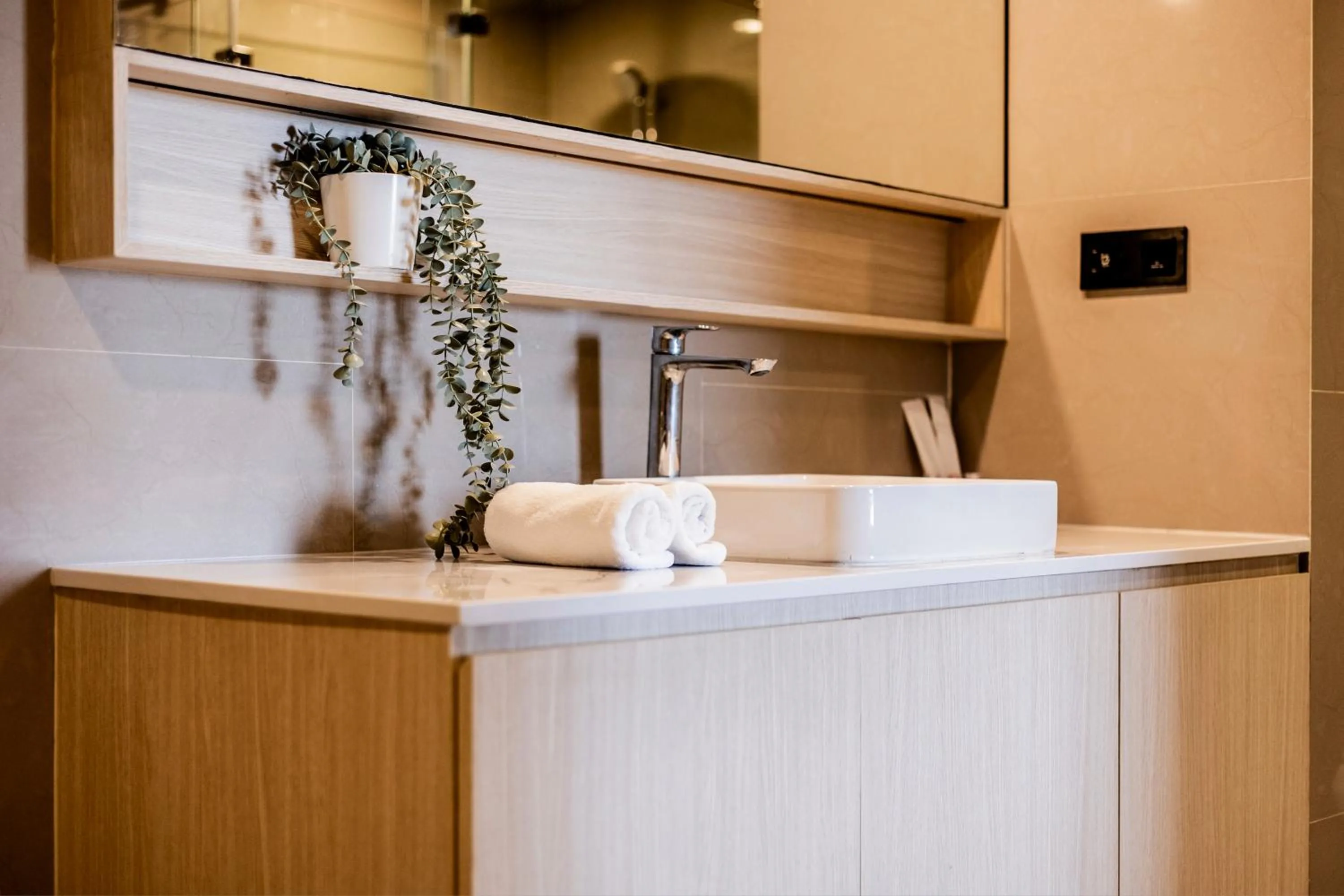 Bathroom in Duplex Liora 1BR PoolsGym Shuttle to Nai Harn