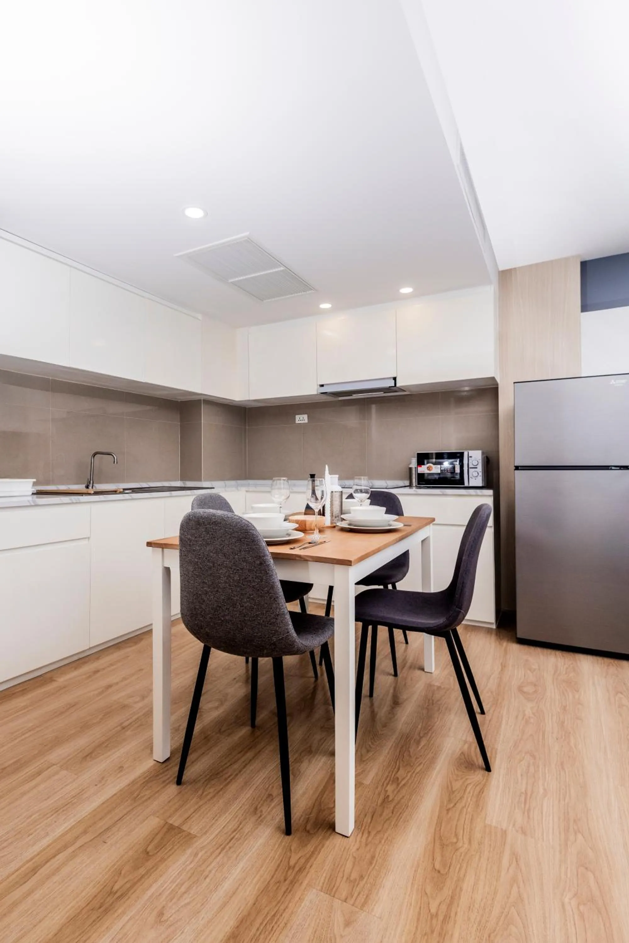 Kitchen or kitchenette in Duplex Liora 1BR PoolsGym Shuttle to Nai Harn