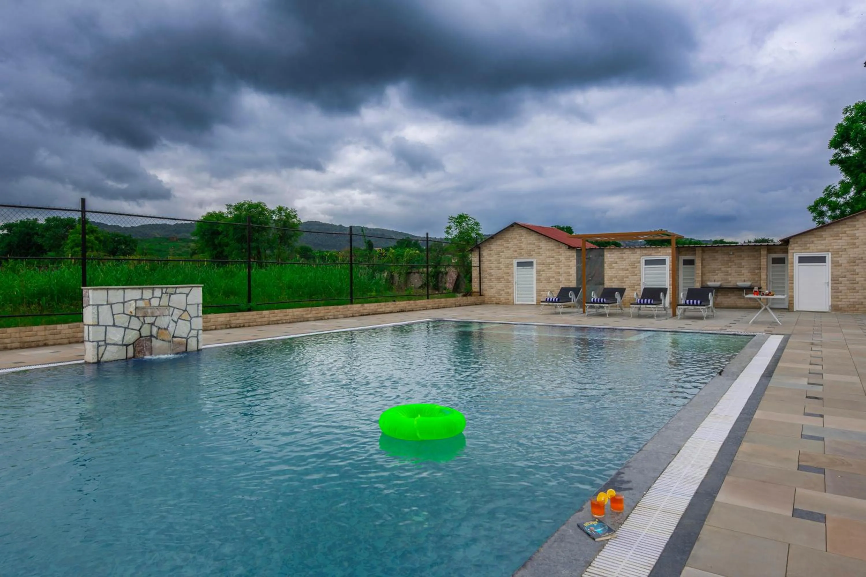 Swimming pool in Aashiyana Luxury Cottages