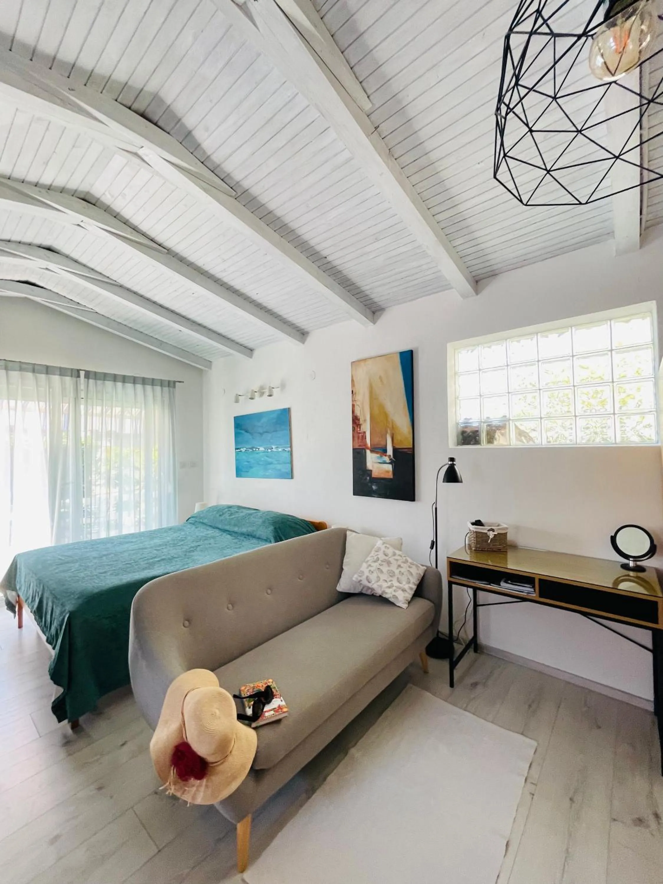 Living room, Bed in Pasiflora Studio