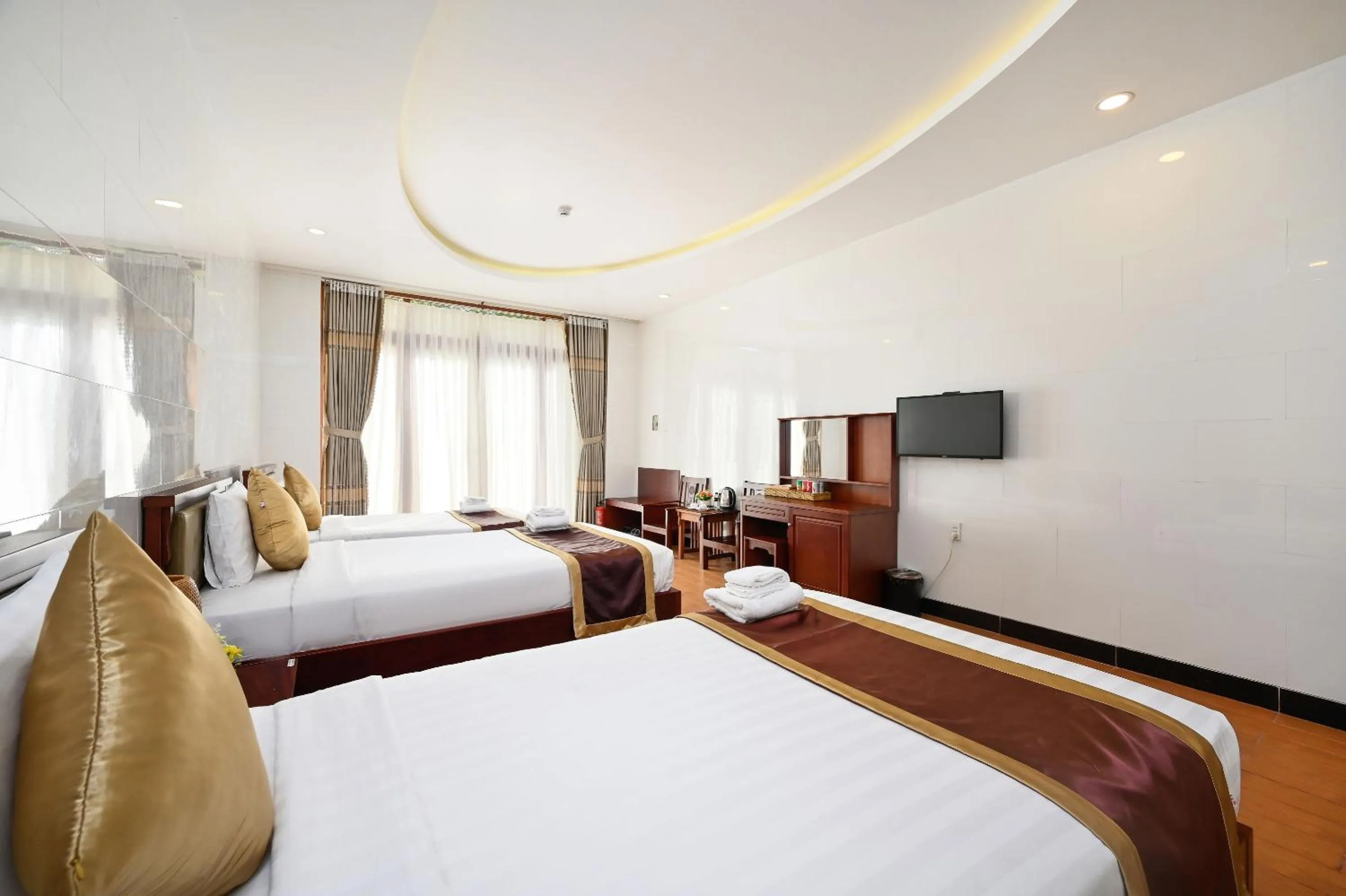Communal lounge/ TV room, Bed in Ha Tien Xua Hotel & Resort