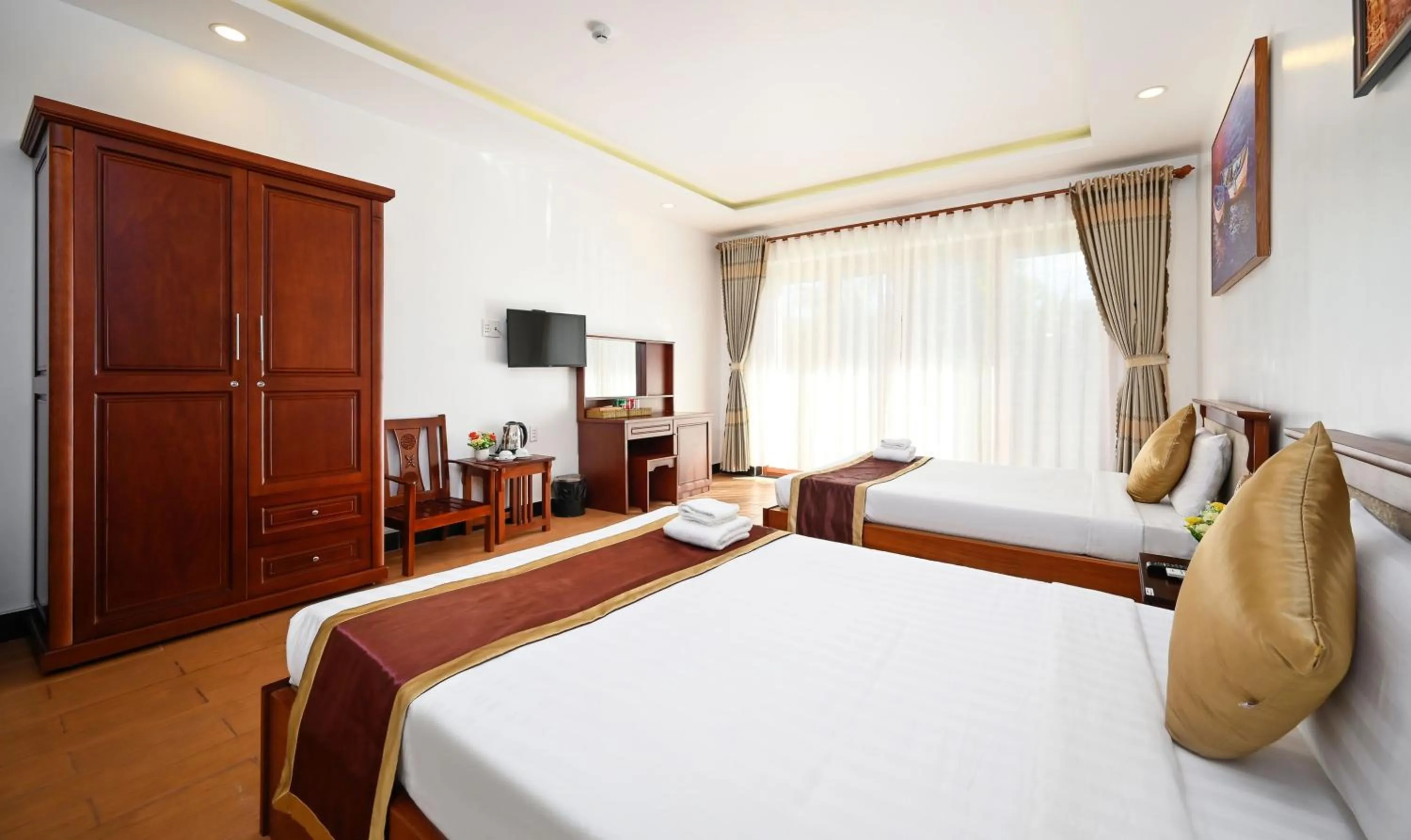 Photo of the whole room, Bed in Ha Tien Xua Hotel & Resort