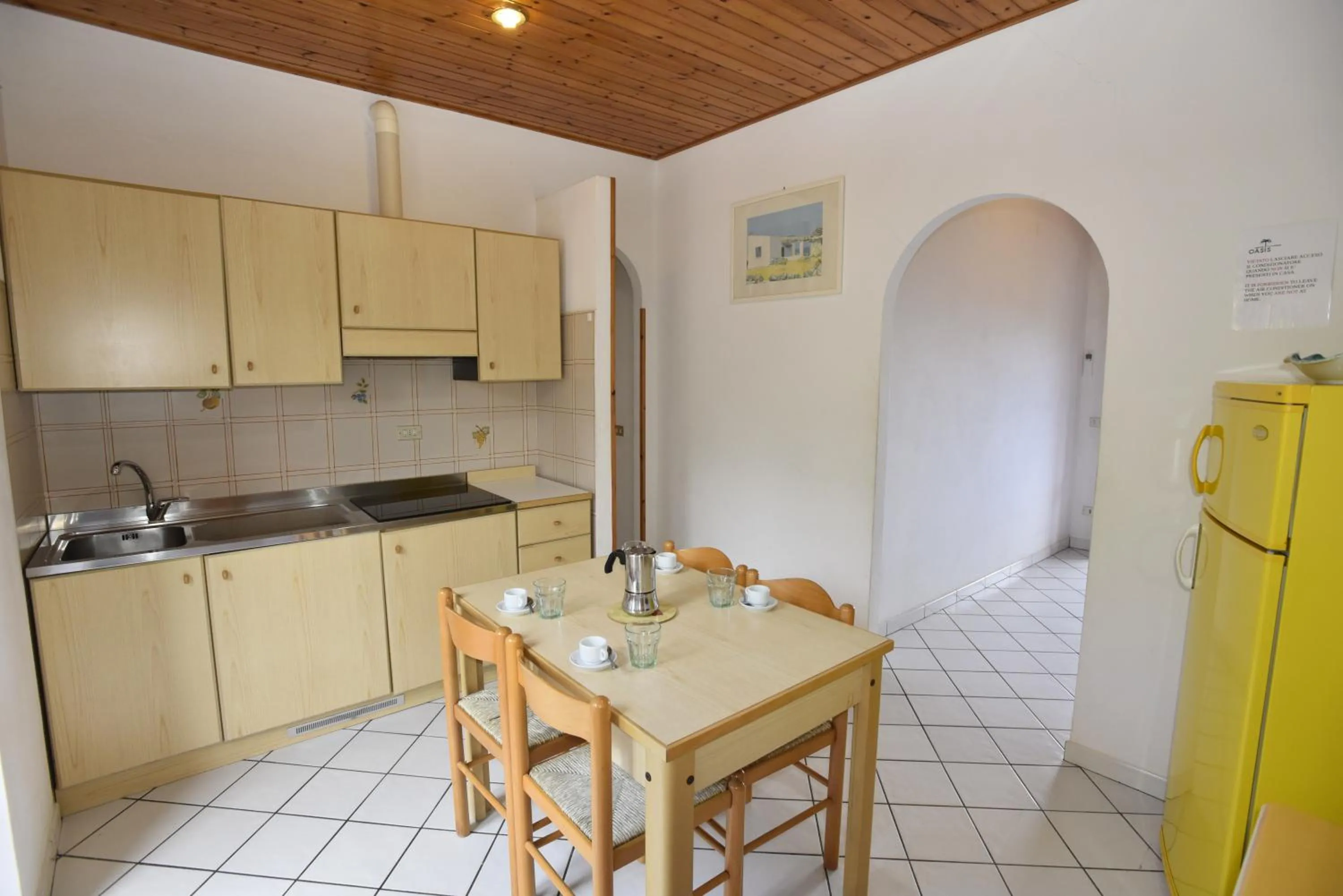 Kitchen or kitchenette in Casa Rosada - Piscina, aria condizionata, terrazze e posti auto