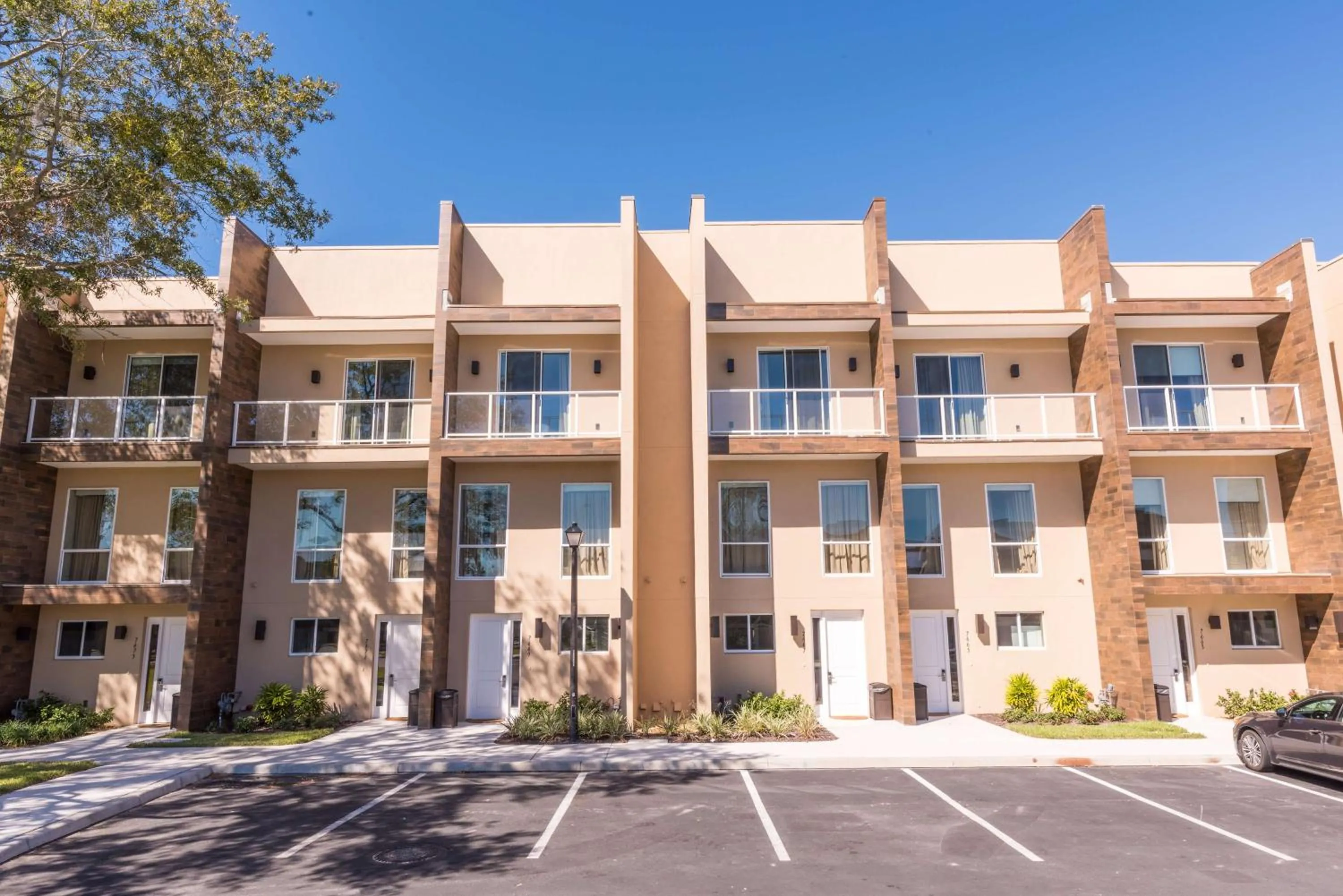 Property building in Magic Village Yards Trademark Collection by Wyndham