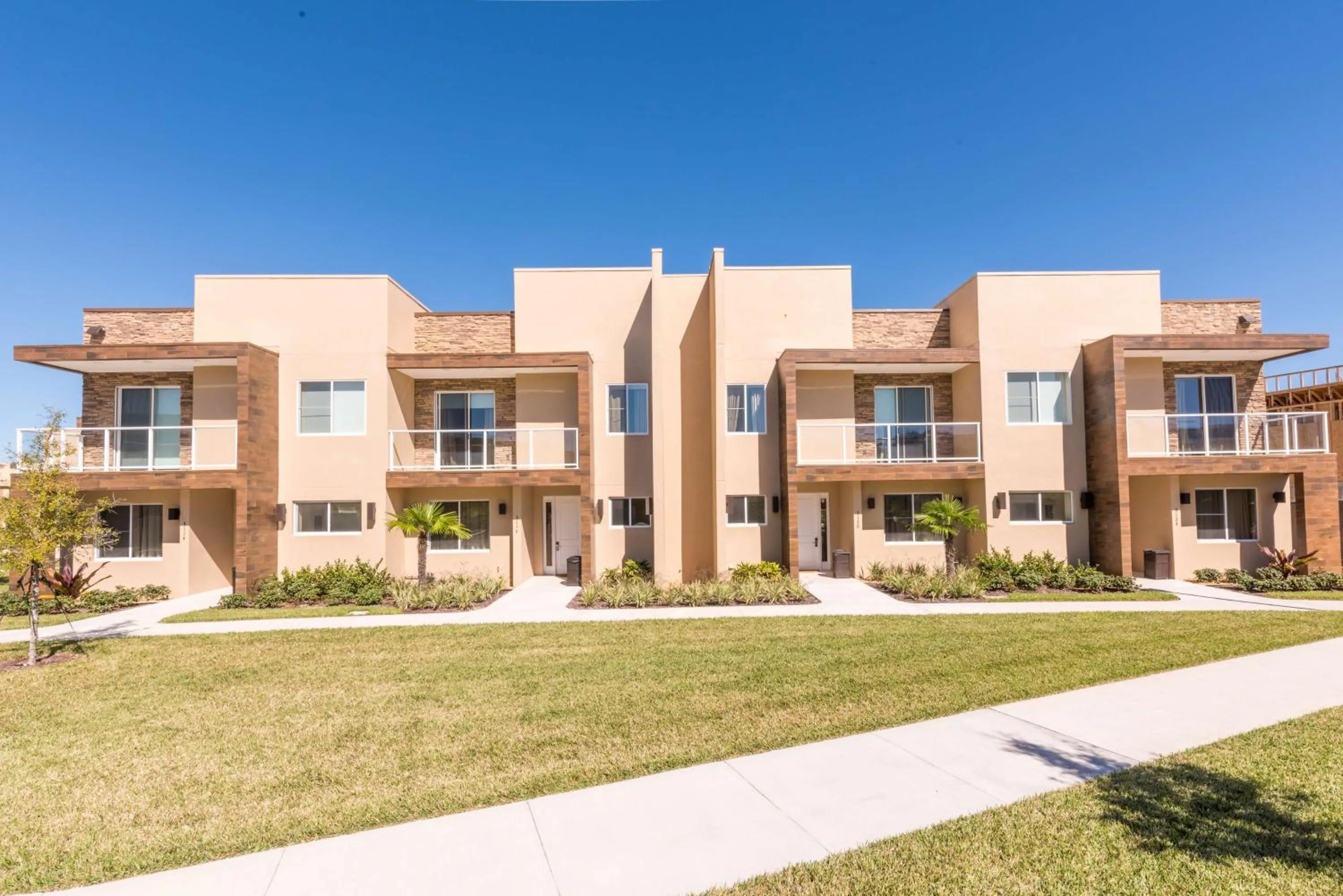 Property building in Magic Village Yards Trademark Collection by Wyndham