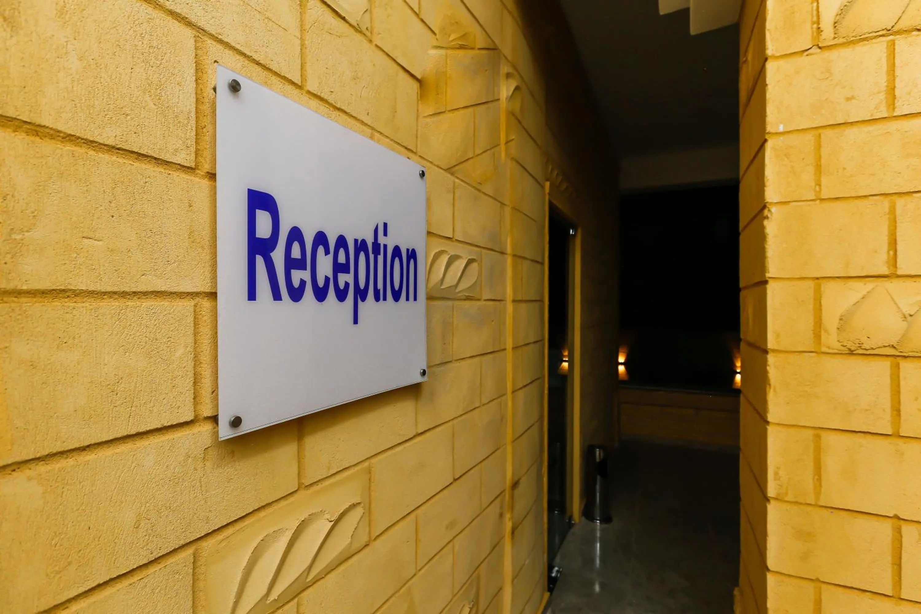 Text overlay in Turquoise Pyramids Gate Hotel City Centre