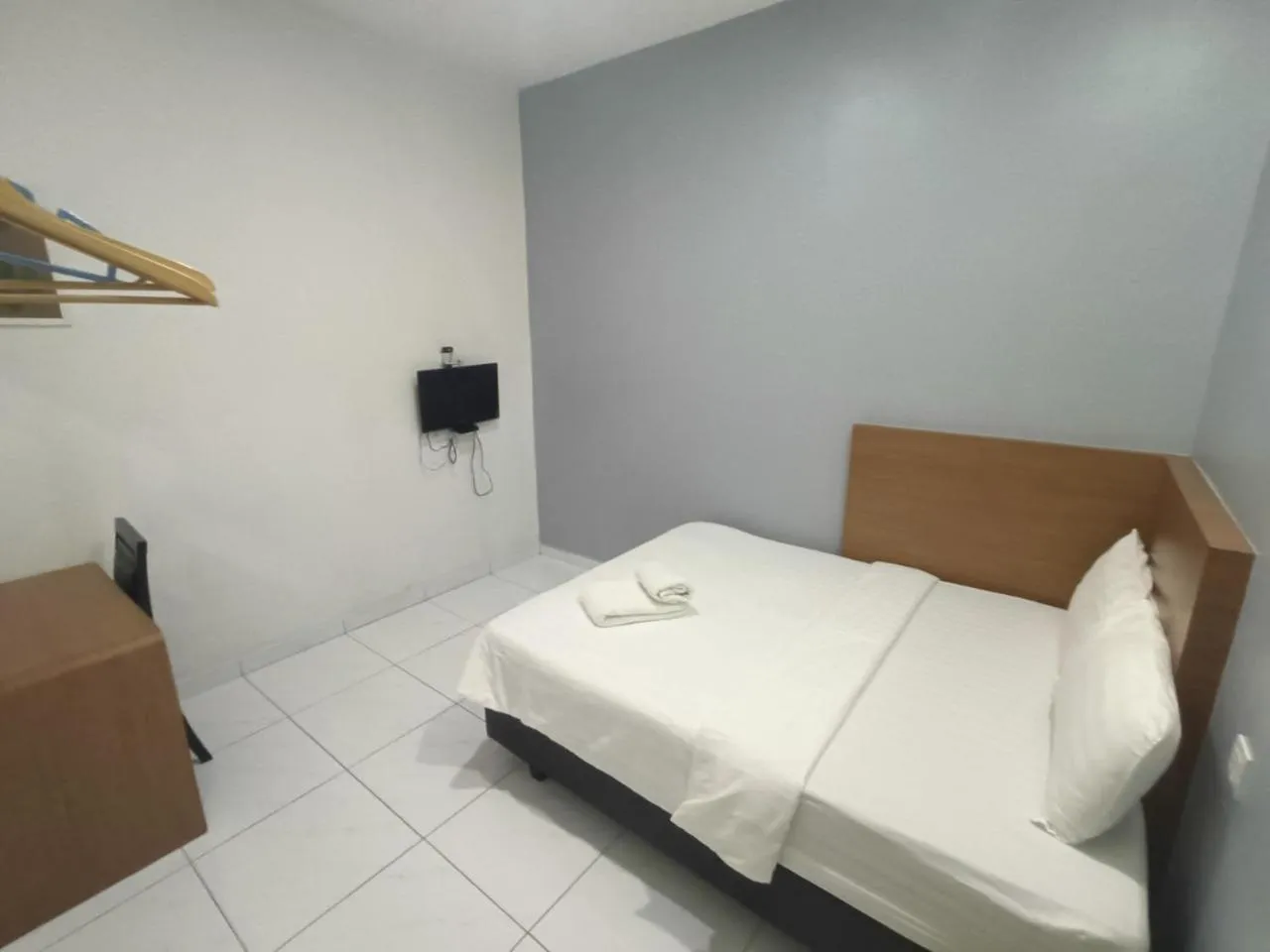 Bed in Hotel Wawasan