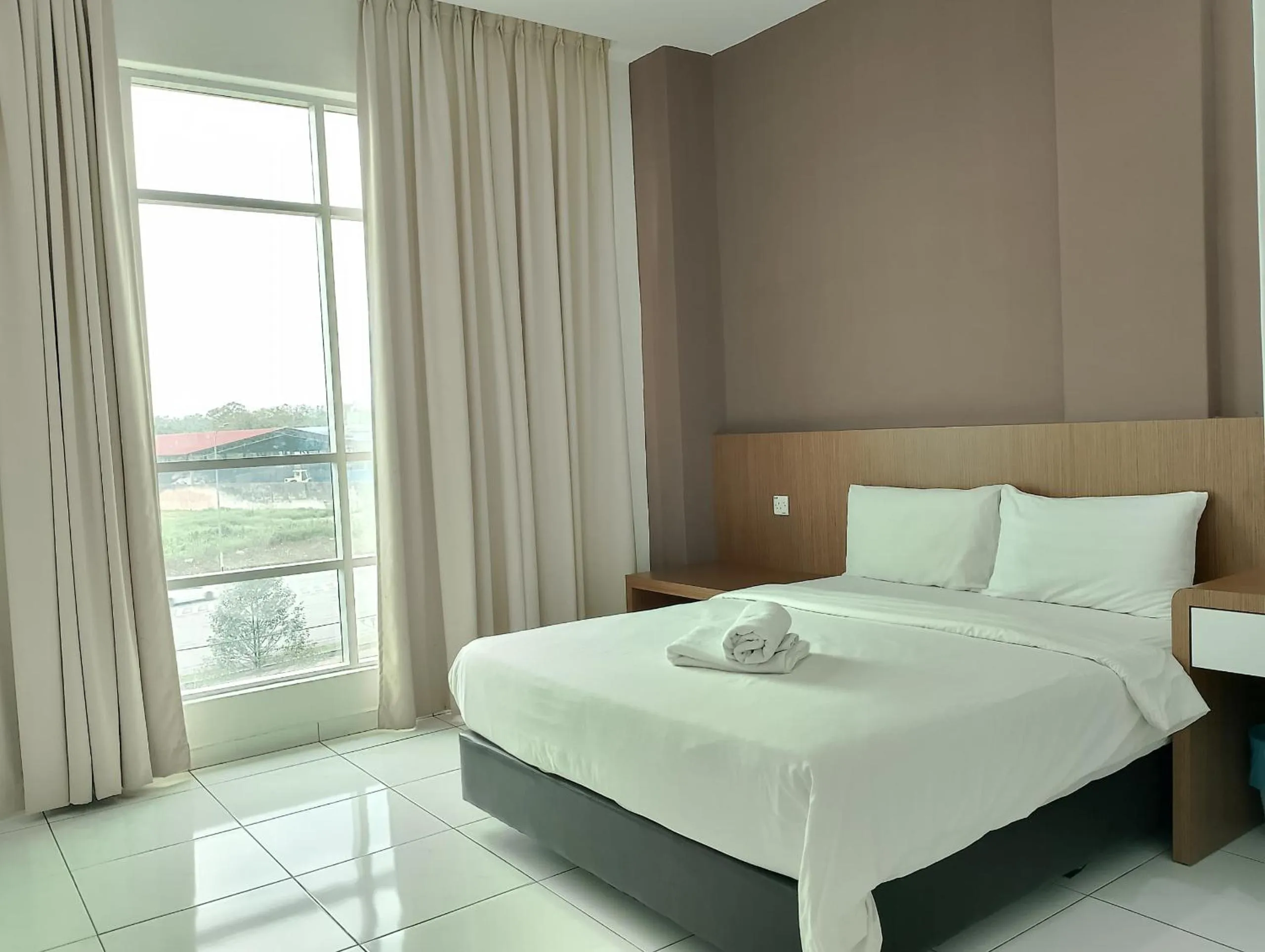 Bed in Hotel Wawasan