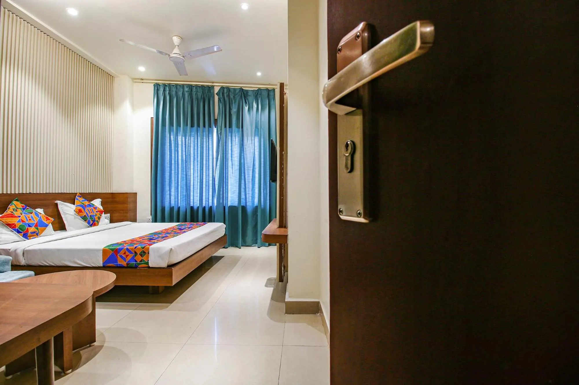 Bed in FabHotel Royal Palace II