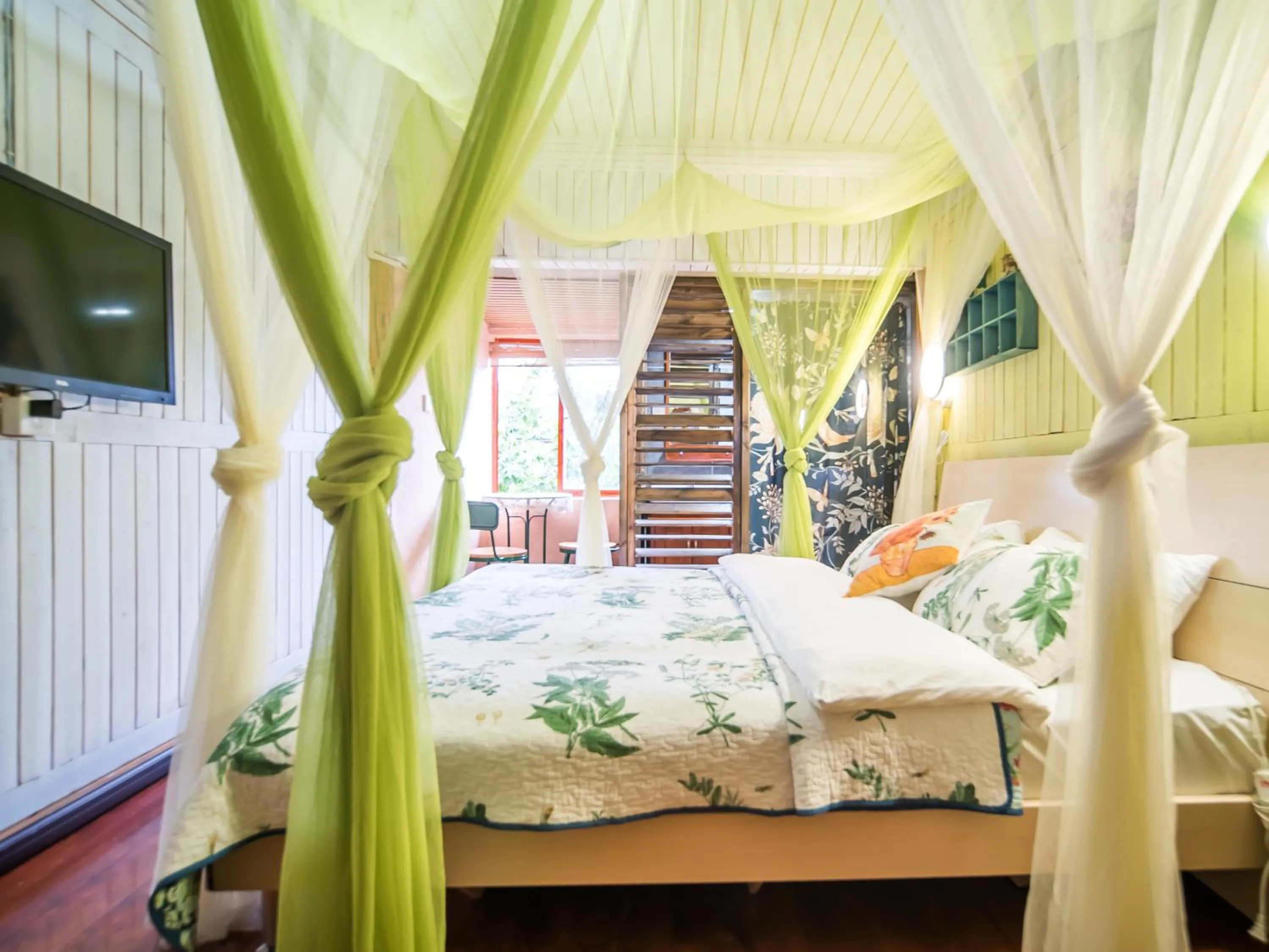 Bed in Tuo Tuo Guest House