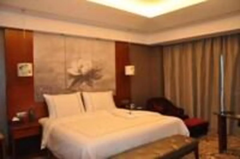 Bed in Grand Skylight International Hotel Gongqingcheng