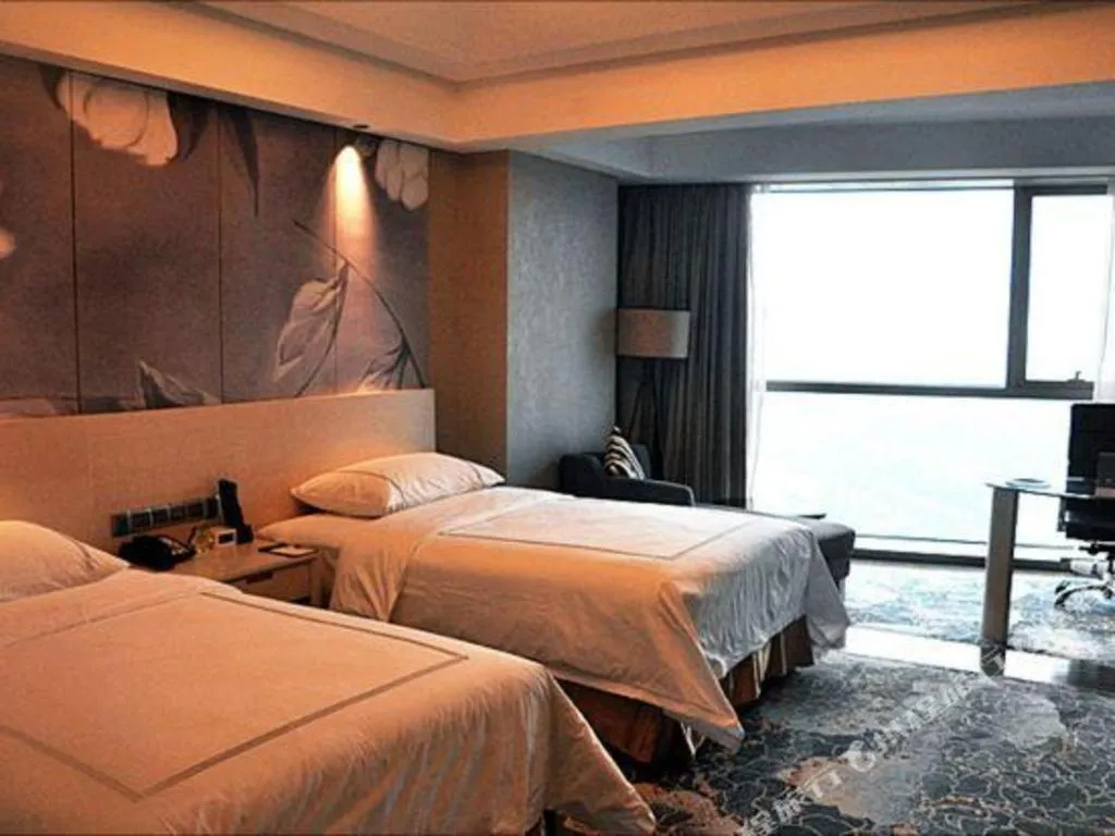 Bed in Grand Skylight International Hotel Gongqingcheng