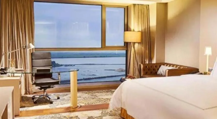 Bed in Grand Skylight International Hotel Gongqingcheng