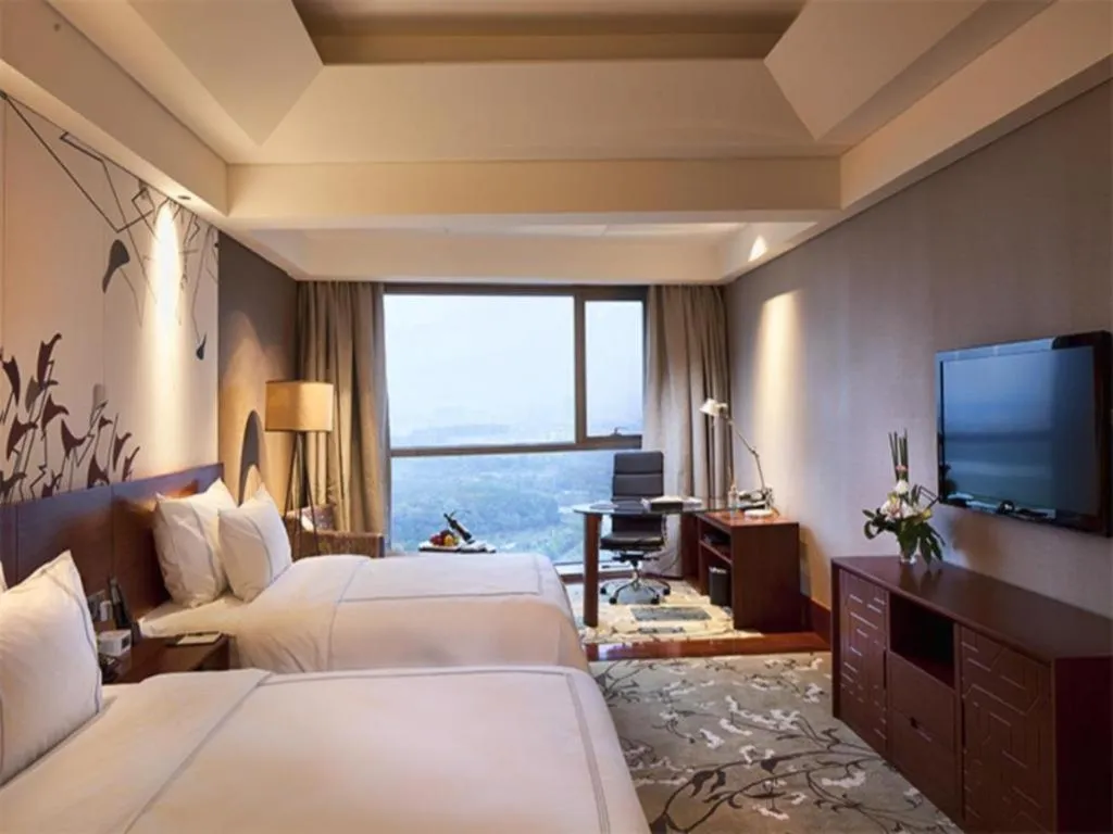 Bed in Grand Skylight International Hotel Gongqingcheng