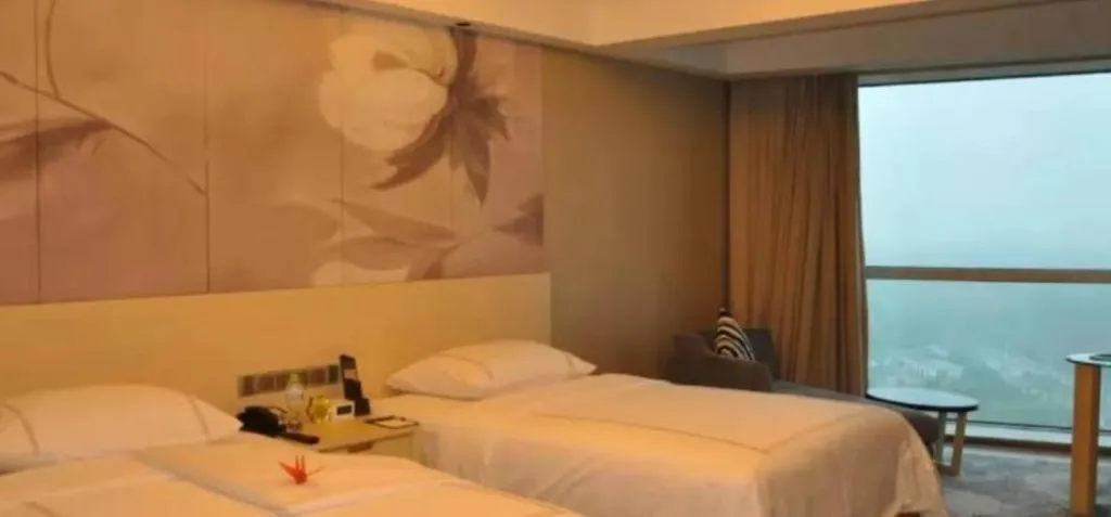 Bed in Grand Skylight International Hotel Gongqingcheng