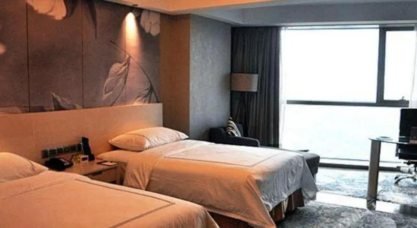 Bed in Grand Skylight International Hotel Gongqingcheng