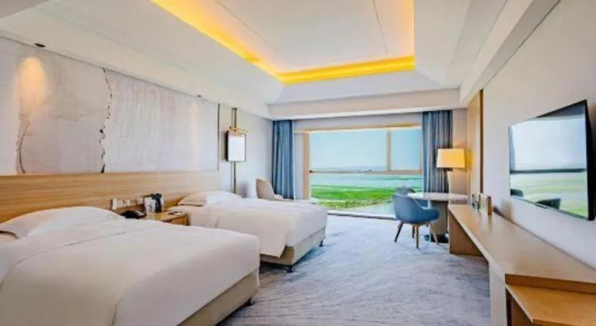 Bed in Grand Skylight International Hotel Gongqingcheng