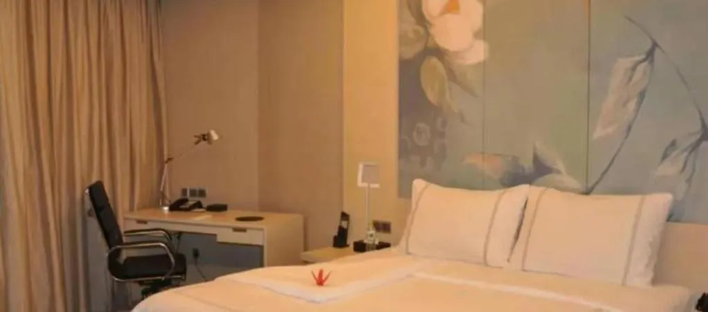 Bed in Grand Skylight International Hotel Gongqingcheng