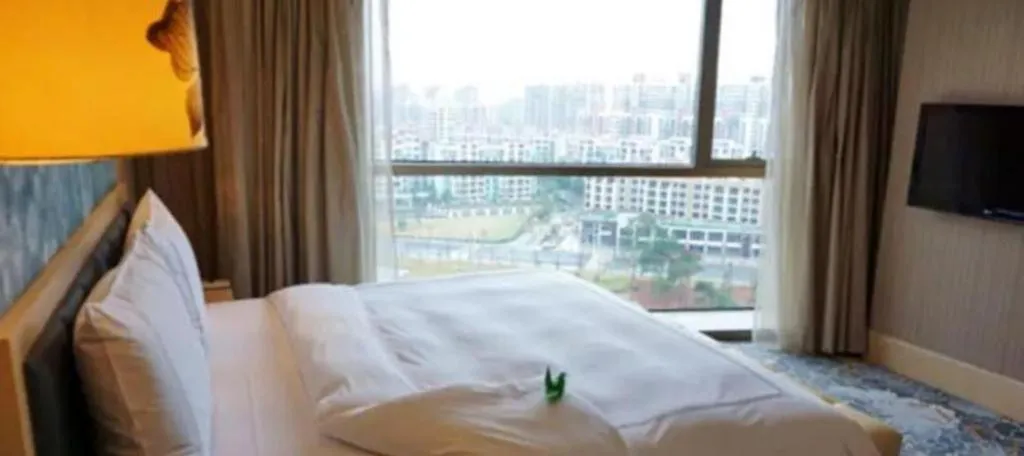 Bed in Grand Skylight International Hotel Gongqingcheng