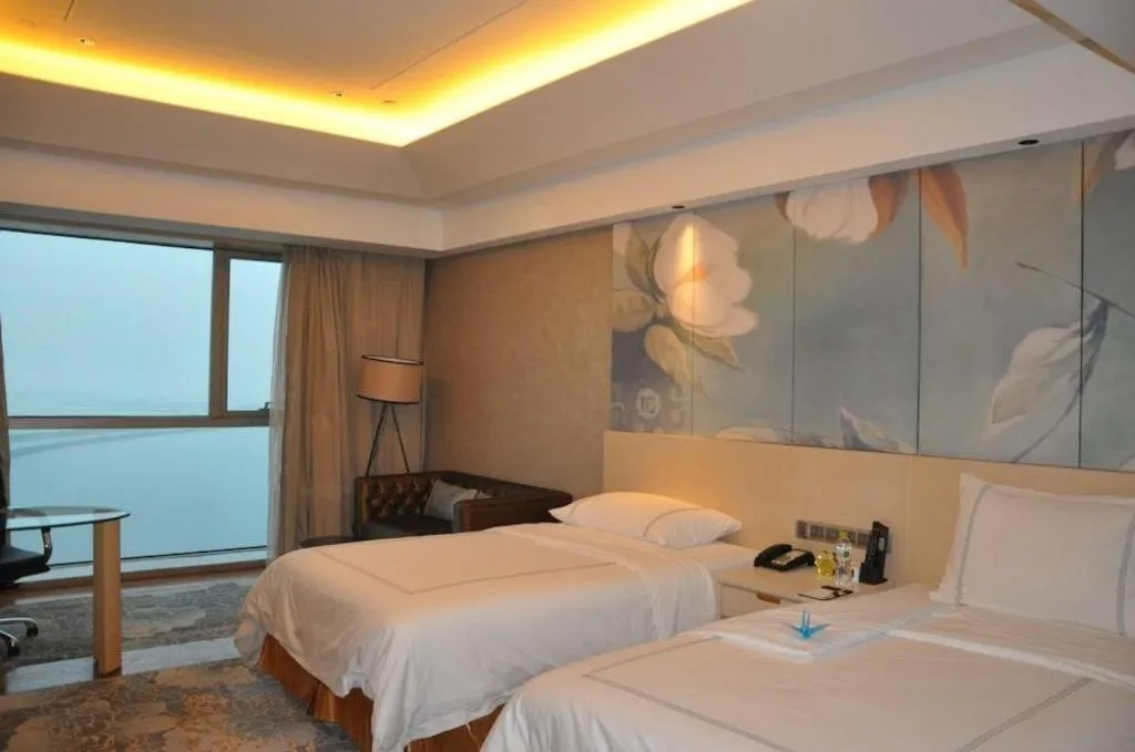 Bed in Grand Skylight International Hotel Gongqingcheng