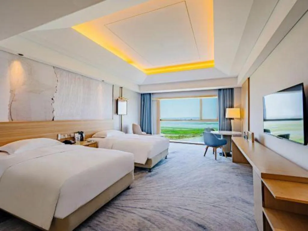 Bed in Grand Skylight International Hotel Gongqingcheng