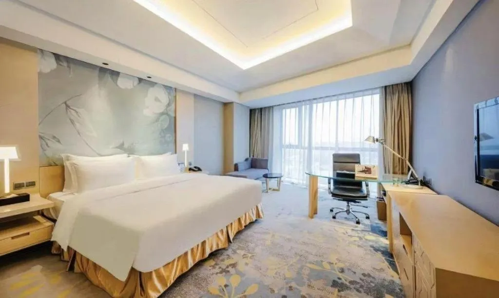 Bed in Grand Skylight International Hotel Gongqingcheng