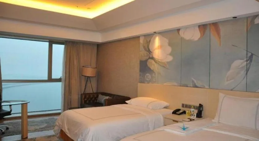 Bed in Grand Skylight International Hotel Gongqingcheng