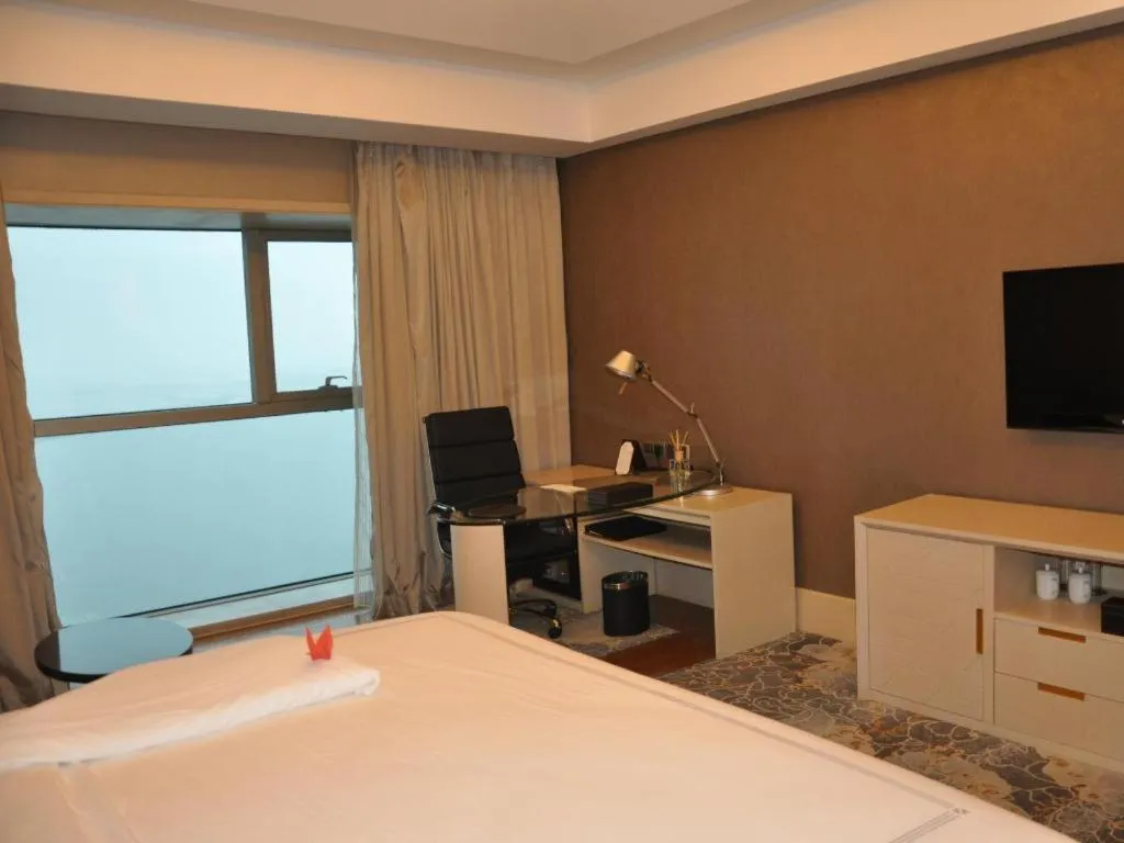 Bed in Grand Skylight International Hotel Gongqingcheng