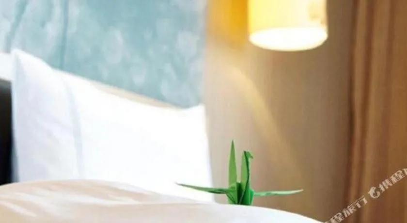 Bed in Grand Skylight International Hotel Gongqingcheng