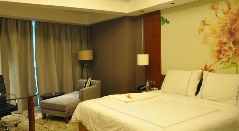 Bed in Grand Skylight International Hotel Gongqingcheng