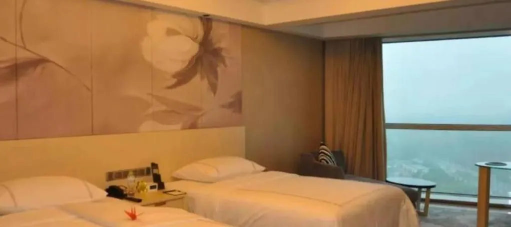 Bed in Grand Skylight International Hotel Gongqingcheng